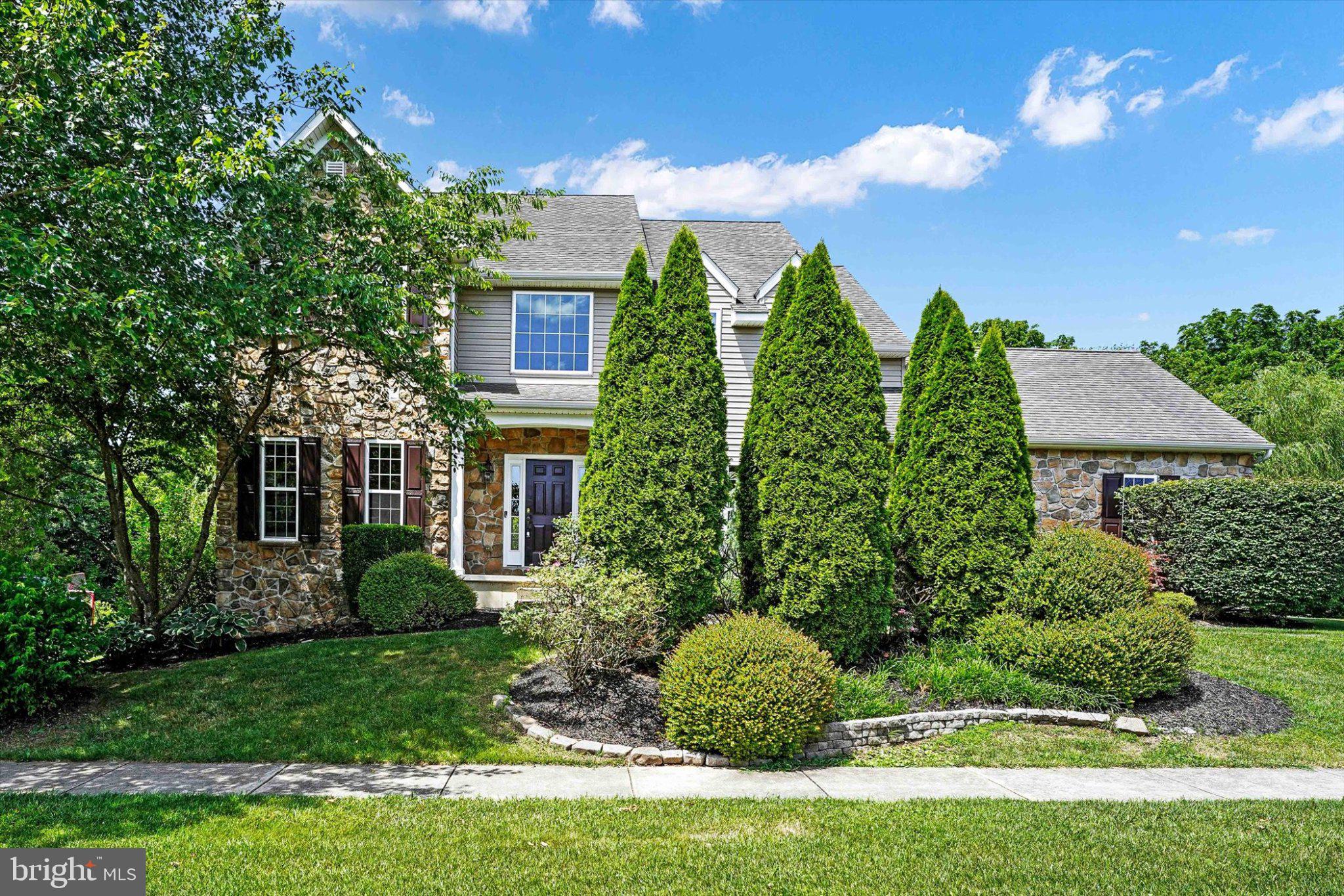 This stunning Colonial home in the desirable Lamborn Hunt community offers a perfect blend of comfort and elegance. With 4 spacious bedrooms and 3.5 bathrooms, this residence boasts a generous 3,882 sq. ft. of living space, ideal for both relaxation and entertaining. The heart of the home features a beautifully designed kitchen with an island, complemented by a breakfast area and formal dining room, perfect for gatherings. Enjoy cozy evenings by the gas stone fireplace in the inviting living room. Renovations in 2024 enhance the home's appeal, ensuring modern comforts throughout. The fully finished basement provides additional living space, complete with shelving and an outside entrance, while the main floor laundry adds convenience to daily life. Step outside to discover a beautifully landscaped yard with extensive hardscaping and a cozy firepit, perfect for outdoor entertaining or quiet moments in nature. The property offers lovely views of the garden and surrounding trees, creating a serene atmosphere. Located in a vibrant community, residents enjoy easy access to Goddard Park, schools, and public services, fostering a strong neighborhood spirit. The well-maintained common areas and sidewalks enhance the charm of this inviting neighborhood. With ample parking, including a side-entry garage and driveway space, this home is ready to welcome you. Experience the warmth and comfort of this exceptional property in Lamborn Hunt!