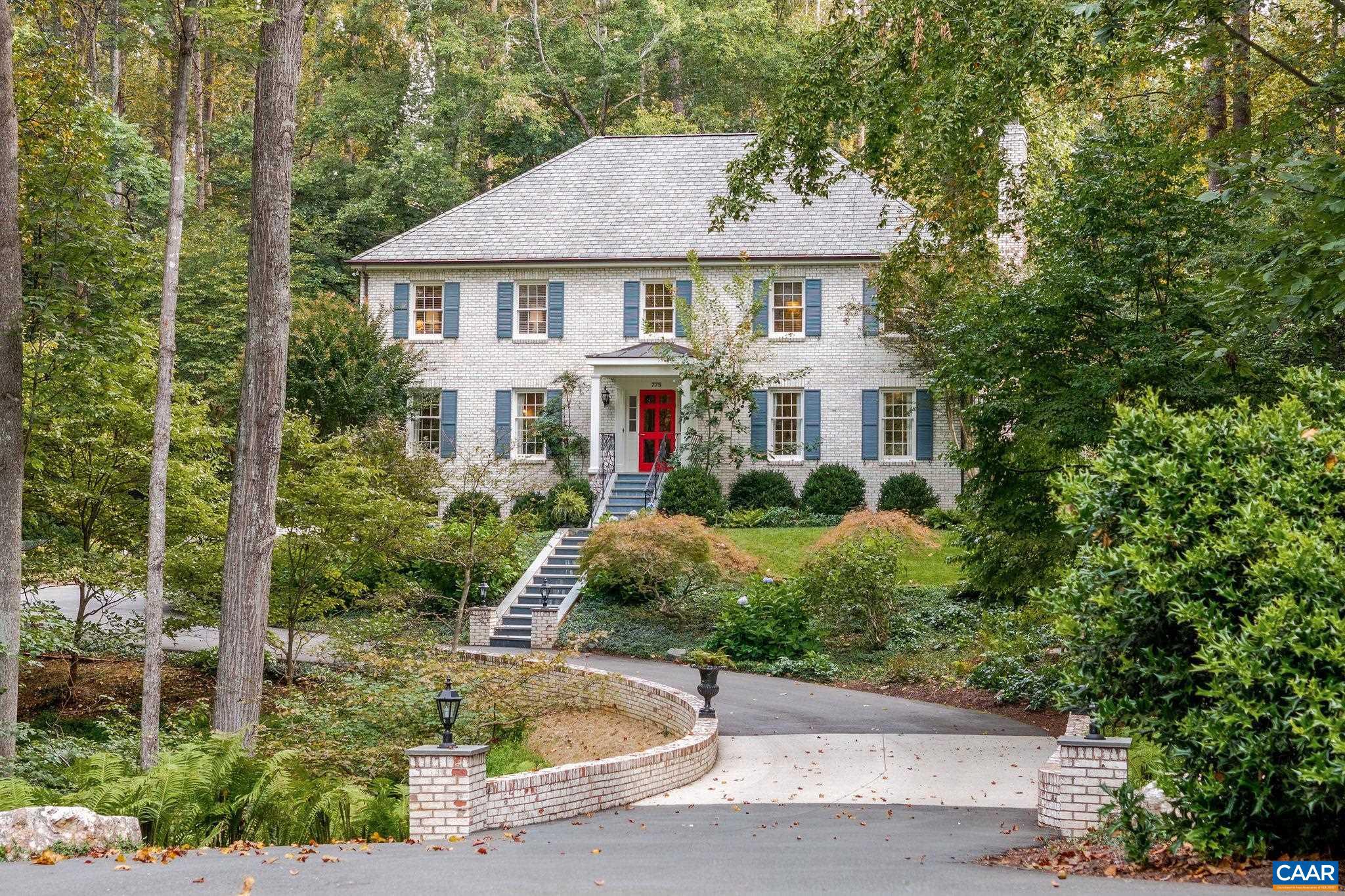This stately, all brick Georgian in Ivy?s Flordon neighborhood has been beautifully maintained & handsomely renovated to suit modern floor plan and interior design preferences.  The 4 bedroom offers extensive indoor & outdoor living spaces including family and sunrooms open to the kitchen, formal dining and living rooms, foyer, powder room & laundry/mudroom,  4 bedrooms and nursery or office upstairs, fab lower level TV room with extensive built-ins and adjacent full bath.  Extensive bluestone patio and terraces.  1.61 private & beautifully landscaped acres moments west of town, adjacent to Farmington in the Murray School District.,Solid Surface Counter,Fireplace in Family Room