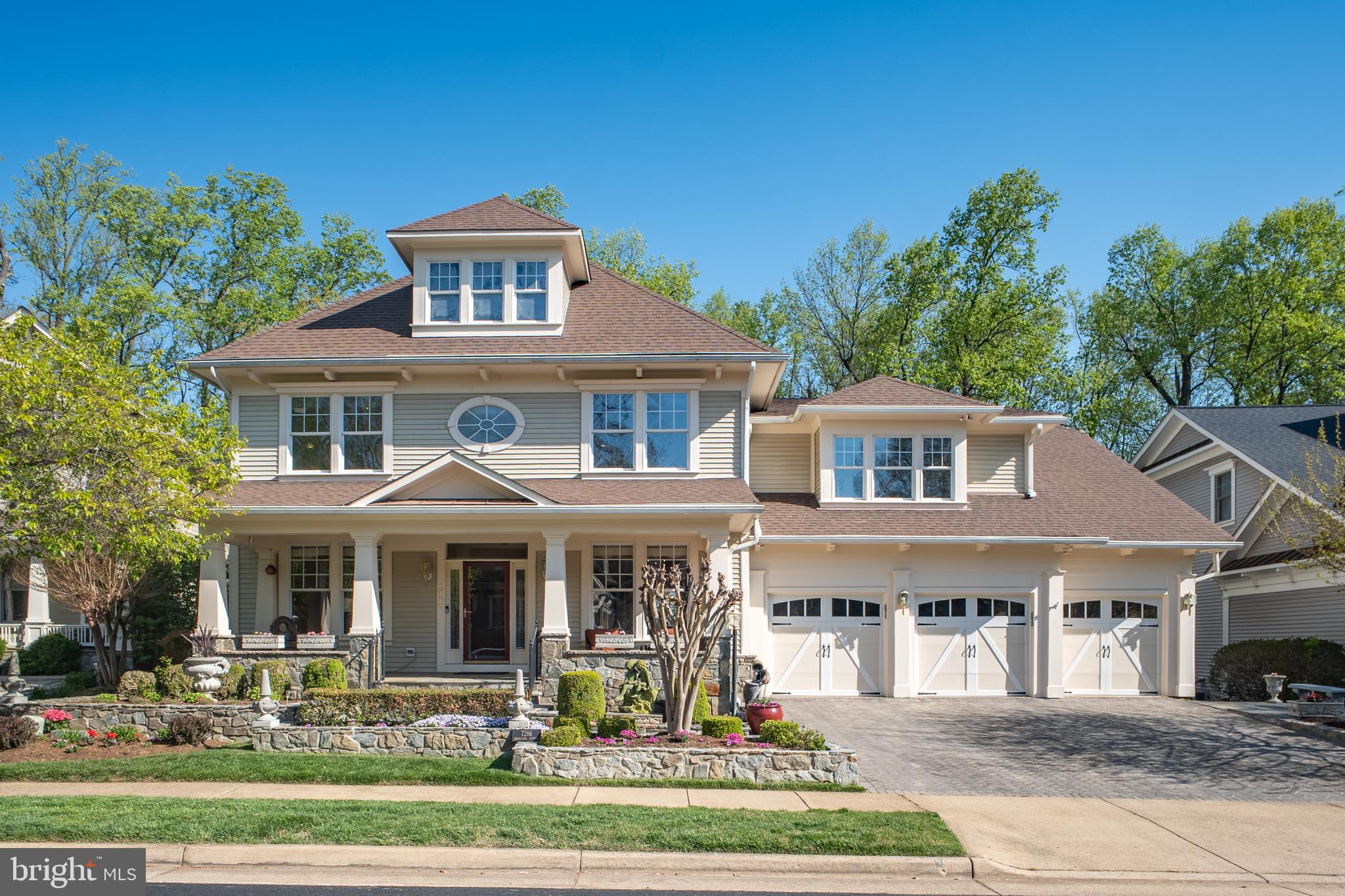 WELCOME! OPEN HOUSE MAY 31st , 12 PM to 2 PM. 
New Price!  A Distinguished Craftsman Estate !

A rare offering in the exclusive enclave of Highland View, this exceptional 6,400+ sq ft Craftsman blends timeless elegance with modern luxury just steps from West Falls Church Metro. Featuring 6 bedrooms, 5.5 baths, and a coveted 3-car garage, the home is set within an intimate cul-de-sac community.

A welcoming bluestone front porch sets the tone for the elegance within. Inside, you'll find freshly painted interiors, soaring 10-foot ceilings on the main level, and 9-foot ceilings on both upper and lower levels. New hardwood floors flow through the formal dining room, great room, and kitchen, complementing the home’s timeless architectural details including crown molding and wainscoting.

At the heart of the home, the newly redesigned kitchen serves as both a showpiece and gathering space, appointed with quartz surfaces, bespoke soft-close cabinetry, professional-grade stainless steel appliances, an expansive island, and a discreet butler’s pantry. The kitchen opens seamlessly into a dramatic two-story great room, where a statement fireplace and walls of natural light connect to a striking double-height Trex terrace overlooking a serene, wooded backdrop—an ideal setting for both grand entertaining and quiet retreat.

The main level is thoughtfully designed for modern living, offering two private offices, a refined mudroom, and a spacious laundry suite.

Upstairs, the luxurious primary suite offering dual dressing rooms and a spa-inspired bath with a soaking tub and glass-enclosed shower.  Secondary bedrooms are generously proportioned and well-appointed, including a Jack & Jill suite and two additional ensuite bedrooms, providing exceptional comfort and privacy. All bathrooms have been thoughtfully renovated in 2016.

The fully finished walk-out lower level is perfect for guests, extended stays, or multigenerational living—complete with a secondary kitchen with new countertops, expansive recreation and lounge areas, a bedroom, an updated full bath, and abundant storage.

Step outside to a peaceful backyard oasis with flagstone walkways, blooming shrubs, and mature trees.

Notable Updates & Systems Include:  Newer roof; garage doors (2020); tankless water heater (2016); dual-zone commercial-grade Trane HVAC system; and a whole-house Generac generator (2021).

Enjoy an unbeatable location to the Metro, W&OD Trail and Poplar Heights Pool & Tennis. Just minutes to Tysons Corner, Falls Church City and the exciting West Falls development. Easy access to Route 7, I-66, Dulles Toll Road, and Route 50.

1-year home warranty included. This is a rare opportunity to own a spectacular home in one of the most convenient and desirable locations in Northern Virginia.