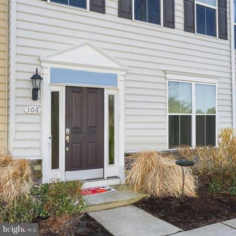 Welcome to Ellendale. This 3 level townhome is approximately 1900  square feet and minutes to the Bay Bridge. The main level offers an open floor plan with 9 foot ceilings, powder room, spacious family room with corner gas fireplace, and sought after main floor bedroom and full bath....There are pre‑wired speakers in the dining room, family room, and deck. There is easy access from rear‑entry garage with driveway.. The Chef's kitchen features handsome cherry hardwood floors and cabinets - stainless appliances, granite counters and adjacent dining area. The second  levels feature 2 more master suites each with full baths. Access the Trex deck for relaxing daily breaks. The upper‑level laundry center has front‑loading appliances. Community amenities include Clubhouse with outdoor pool, walking trail to the fishing pier and floating dock. There is also kayak and boat storage, a tot lot, rambling sidewalks, and abundant street lighting. More pictures Coming Soon !!