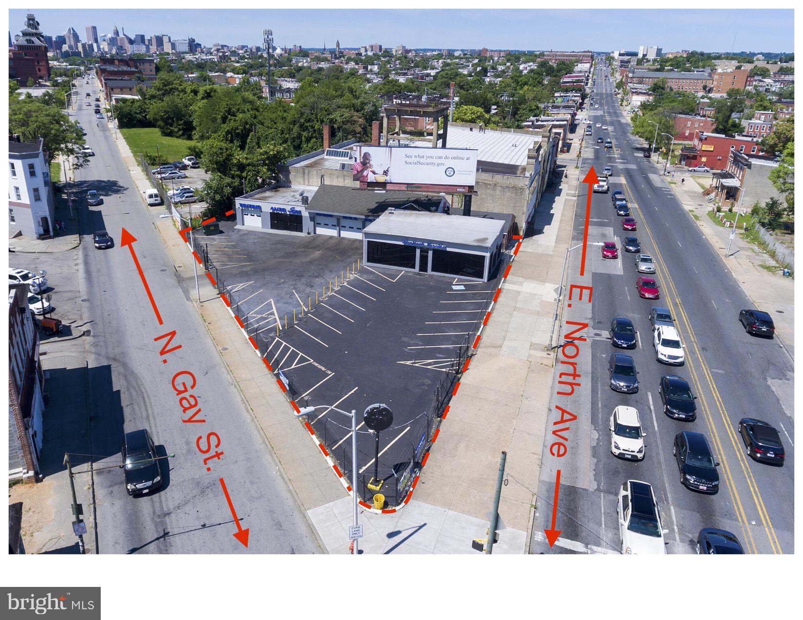 Incredibly busy Retail / Automotive corner property in Baltimore City! This property has over 190 feet on E. North Avenue and 193 feet on N. Gay St. Outstanding visibility!! This property also features 4 drive in doors (w/ Openers), 4 recently renovated bathrooms, a fenced-in 27 space parking lot, Floor to ceiling windows.  Property has great potential and many uses! Billboard on property is leased and receives income!  Immediate availability!  Property is located within A Baltimore Opportunity Zone and A Baltimore Enterprise Zone. This makes it eligible for possible tax credits!