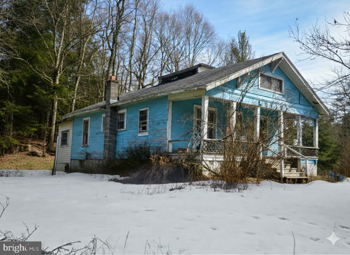 **Investor Special with Mountain & Water Views**
Opportunity is knocking at 74 Parks Road in Oakland, Maryland! This 3-bedroom, 1-bath one story is perfectly positioned just steps from the West Virginia line and surrounded by some of the most sought-after recreation in the region.
Enjoy peaceful views of Snowy Creek right from the front yard and take advantage of being just minutes from Deep Creek Lake, Alpine Lake Resort, and Herrington Manor State Park — offering year-round activities including boating, fishing, hiking, skiing, and more. Whether you're looking to create a full-time residence, mountain getaway, or short-term rental investment, the location alone makes this property standout.
The home is ready for renovation, offering a blank canvas for investors or buyers eager to design a space tailored to their vision. With a desirable ranch-style layout and strong potential, this property presents a chance to create something truly special in a sought-after area.
If you've been searching for a project property in a high-demand recreational area with creek views and proximity to multiple lakes and state parks — this is your chance to build equity in one of Western Maryland’s most scenic settings.
Bring your builder or contractor and your creativity — the possibilities are endless!