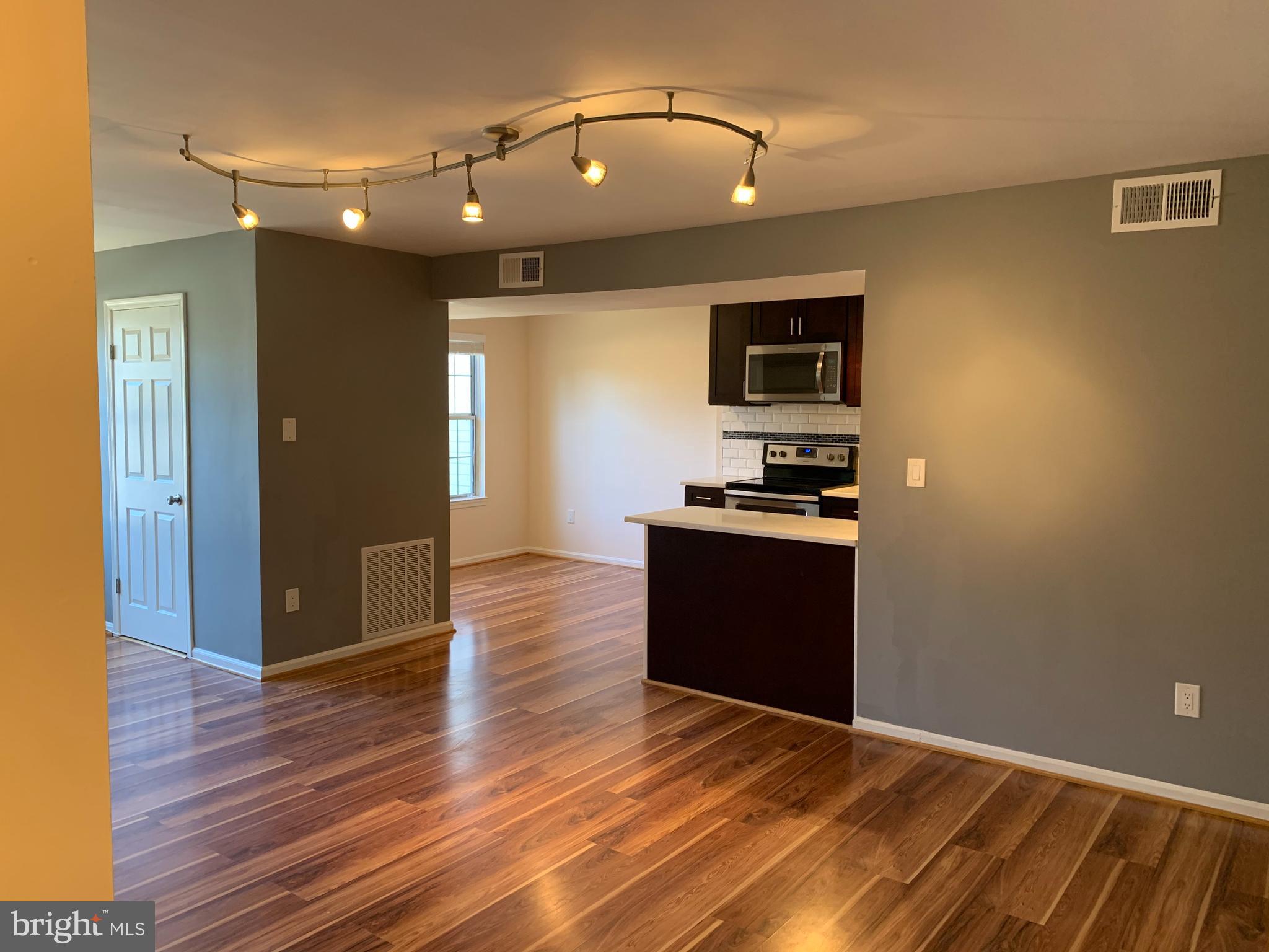 Beautifully updated 2-bedroom, 2-bathroom condo is located in the Longmead Crossing community. The open-concept living area provides a spacious and inviting atmosphere. The kitchen has been fully renovated with sleek granite countertops and stainless steel appliances. For added convenience, the unit includes an in-unit washer/dryer. Both bathrooms have been completely remodeled. The community offers a variety of recreational outdoor spaces, and the location is just minutes from major highways and public transportation.  Close to many shopping and dining options.  Don't miss it and schedule your showing now!!