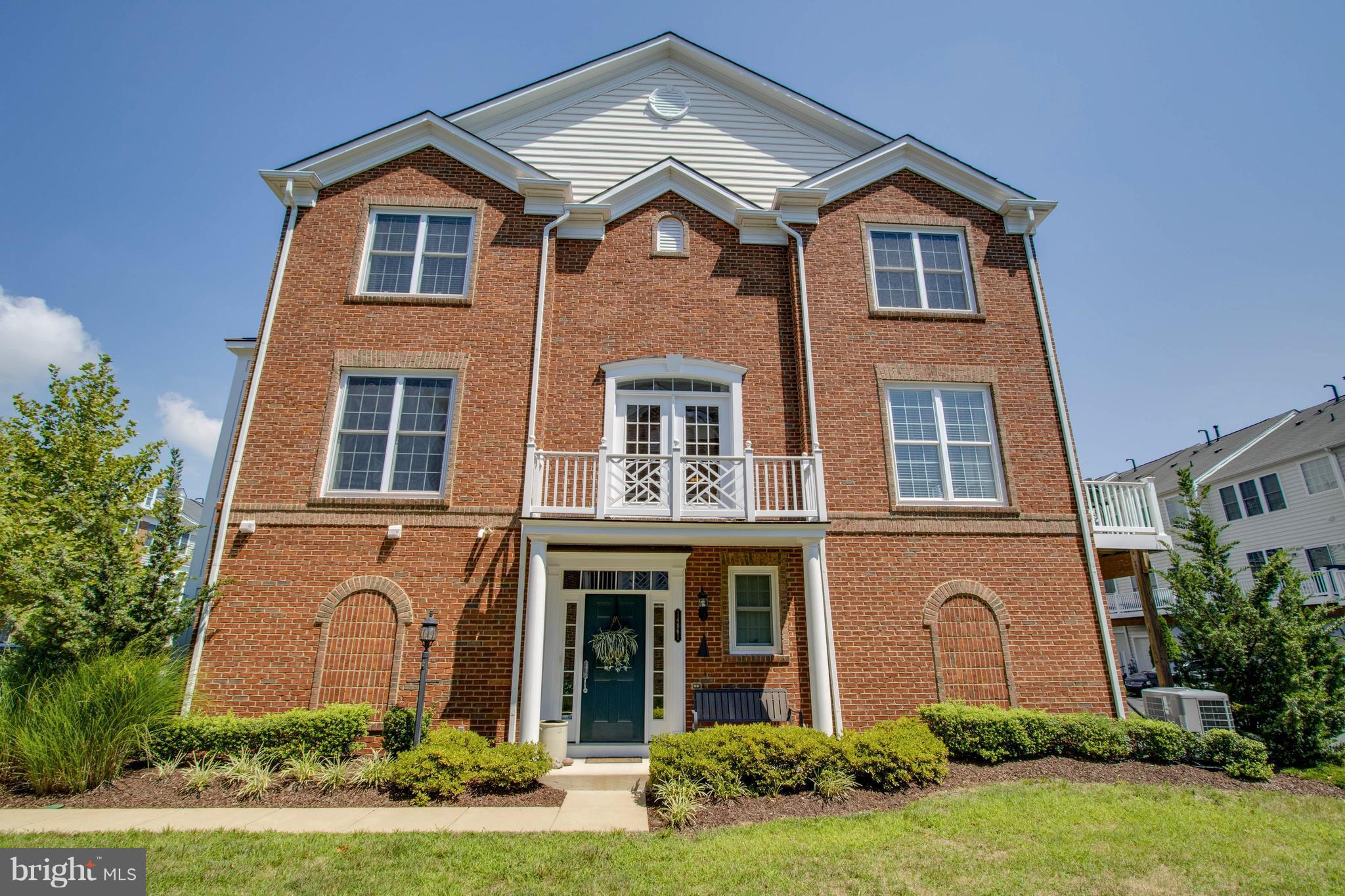 Oh so pretty..end TH w/beautiful Cherry hardwood flooring on main living level. Spacious LR w/ Gas FP/formal DR/Gourmet kit w/Convection cooking/hi-end SS appliances/island &casual dining w/deck access. Entry level bedroom/office/family room...you pick! Master suite w/ jetted tub/sep shower/double granite vanities.2 car gar. NEW Carrier HVAC. Wegmans/shops/eateries/I95 Rte 1 commuting lines nearby