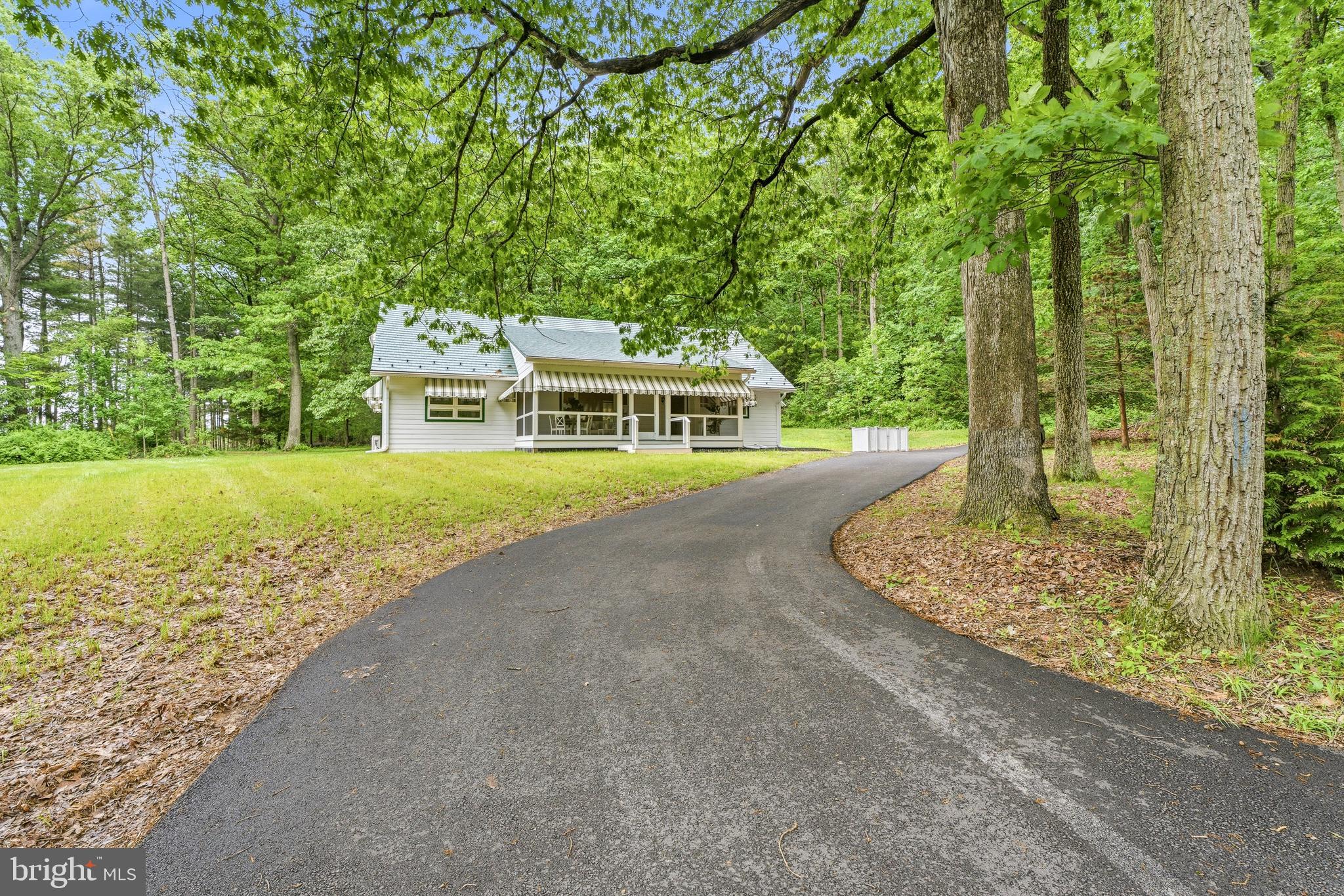 Perfectly located just minutes from the heart of both Hampstead and Westminster, this meticulously renovated four-bedroom home offers the perfect blend of peaceful country living and convenient access to shopping, dining, and everyday amenities — all set on over three beautiful acres.

Every inch of the property has been thoughtfully updated with extremely high-end craftsmanship and quality materials throughout, making this truly a move-in-ready opportunity. Recent major improvements include a brand-new roof, new windows, new well, new septic system, upgraded water filtration system, and extensive custom built-ins throughout the home.

Relax on the welcoming front porch or enjoy the spacious rear addition designed for comfortable everyday living and entertaining. Inside, the home is filled with warmth and personality, highlighted by a lovingly designed retro-inspired 1950s kitchen that brings charm and style together in the best way possible. Whether you appreciate vintage design or simply love a home with character, this space is unforgettable.

The thoughtfully designed layout includes two first-floor bedrooms, offering flexibility for guests, multi-generational living, or convenient one-level living. One bedroom features an en suite full bath, while the second offers its own en suite half bath. Upstairs, you’ll find two additional exceptionally large bedrooms, creating comfortable and versatile living spaces throughout the home.

The expansive basement offers endless possibilities with three egress windows, abundant storage, and the perfect opportunity to create a recreation room, gym, workshop, home theater, or additional living space.

This beautiful home has truly been gone through from top to bottom. From the major systems to the custom details, everything has been thoughtfully completed — all that’s left to do is move in and enjoy. see full list of updates below;


Front porch edition 2024
Back family room edition 2025
New Hvac 2025
House completely rewired 2025
New roof 2024 (40 year metal roof by Kasell and Irons)
New Windows 2024 (Anderson elite E series, architectural collection)
New well jet pump 2023
New septic tank 2023
Kitchen remodel (with new appliances ) 2025
Heat pump Daikin 2025
All new paint 2025
All new built-ins 2024
Oak floors completely redone in 2024
Custom-made patio Nicolock pavers 2025
Two new bathrooms, 2024
New driveway installed and 2025
Second floor, Marmoleum floors made by Forbo floors (eco-friendly)
Custom awnings made by Hawk Awnings 2025