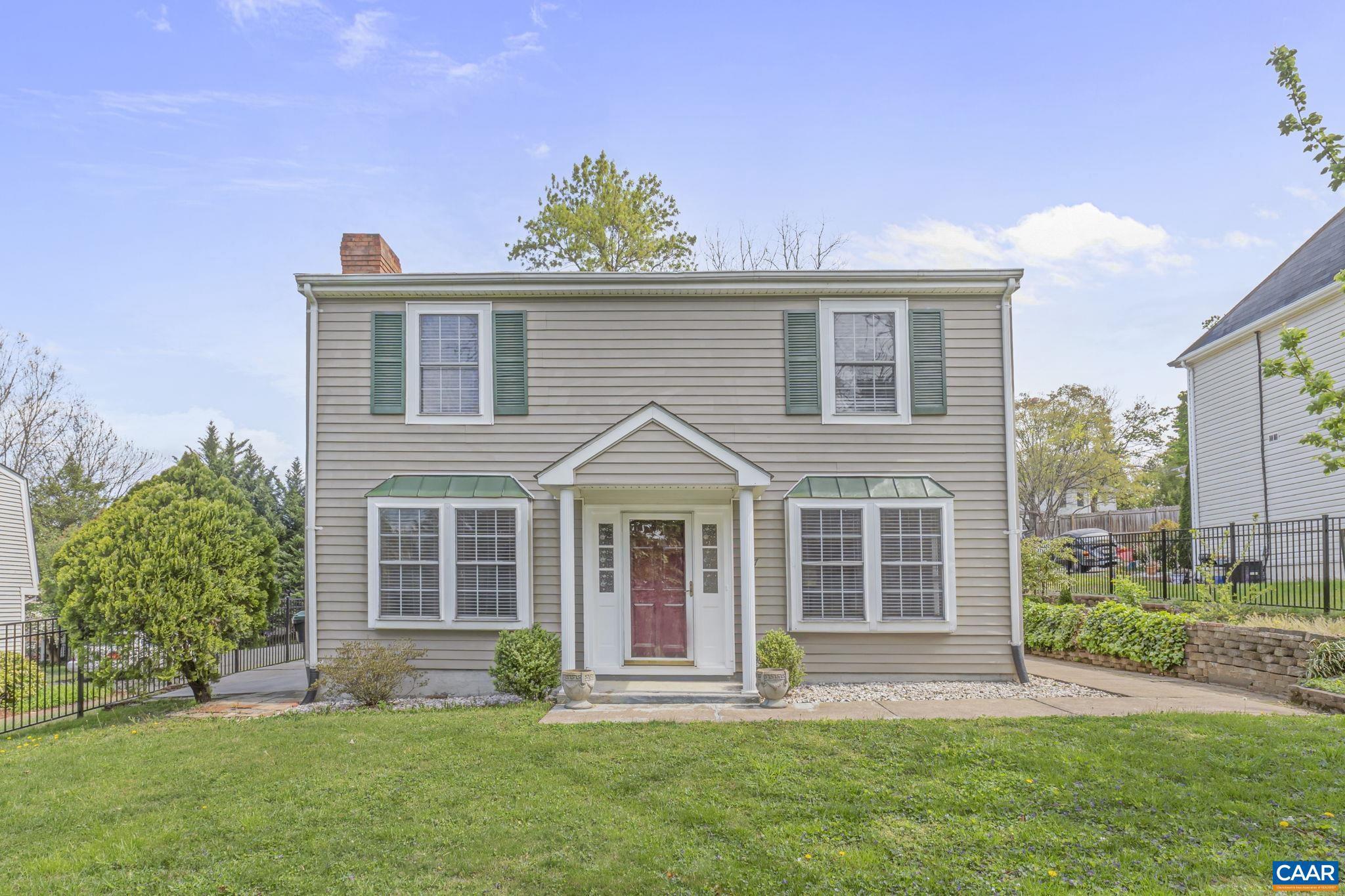 So close to Downtown!  This well-maintained 3 bedroom 2.5 bath features an updated kitchen, separate dining room, and a living room with a fireplace. Outside, enjoy a fenced yard perfect for pets, play, and gardening, plus a separate storage room for all your extras.  Come take a look!,Formica Counter,Wood Cabinets,Fireplace in Living Room