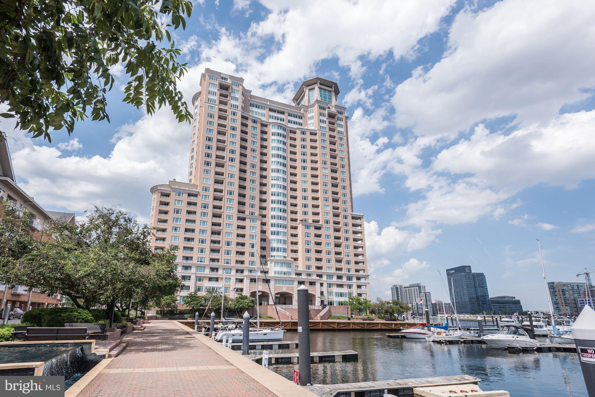 Unit 1708 - a sophisticated 17th floor condominium features approximately 1,138 square feet of living space enhanced by spectacular views of the Baltimore Harbor. This home offers an open floor plan with a spacious living/dining room combo, a private one bedroom ensuite, and a separate powder room. The primary bedroom is spacious and well-appointed with extensive, mirrored built-ins for added storage and convenience. Two gated garage parking spaces convey.

The living/dining room combo affords great entertaining and daily living with beautiful custom built-ins and easy access to the private outdoor deck. A sun-drenched unit boasts large windows throughout the home that highlight spectacular views of the Domino Sugars sign, the cruise ship terminal, the outer harbor and the
build site for the Key Bridge.

Building amenities offer a gym with ellipticals, treadmills and free weights, an indoor pool, outdoor pool, party rooms with billiards and a cozy fireplace, as well as a 24/7 front desk - adding to the luxurious lifestyle the residents enjoy.

Close proximity to major arteries - I-95, I-83, and to BWI Airport and AMTRAK stations makes for easy commuting.  And The Harborview Towers - located on the Inner Harbor Promenade - afford access to restaurants, shopping, and events as well as Ravens Stadium and Oriole Park.