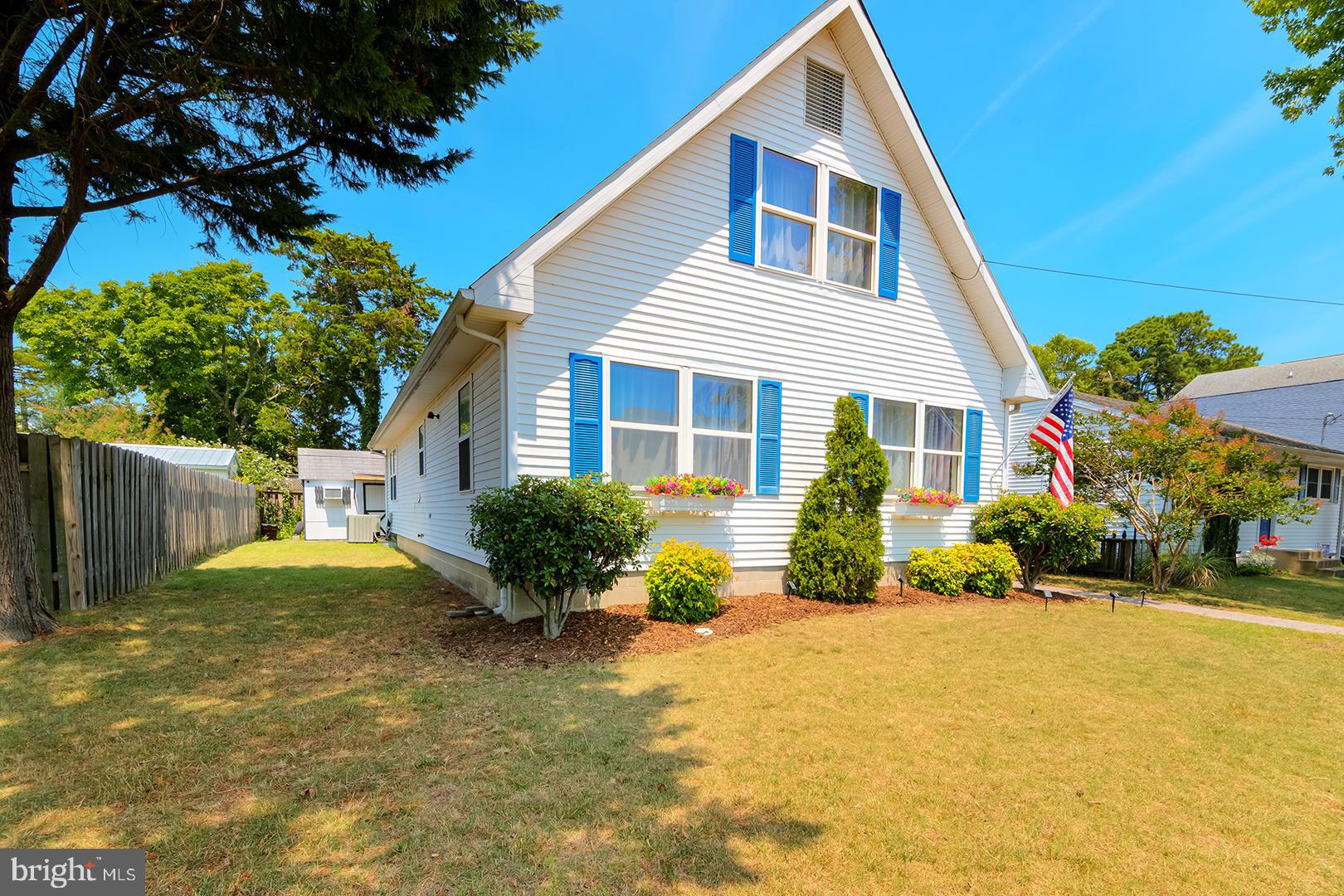 Tucked away on a quiet street in the sought-after Bay Vista community, this charming Salt Box home offers the perfect blend of coastal tranquility and everyday convenience. Featuring 4 bedrooms and 2 full bathrooms, the home is thoughtfully designed with a main-level bedroom and full bath, making it ideal for guests or easy first-floor living. The bright and airy living room welcomes you with abundant natural light, while the kitchen flows seamlessly into the dining area—perfect for gathering with family and friends. After a day at the beach, rinse off in the outdoor shower before relaxing on the screened porch, an ideal setting for classic crab feasts and warm summer evenings. Additional highlights include a storage shed outfitted with electric, workbench, shelving  and a window air conditioning unit, making it a terrific workshop, as well as a private driveway with parking for two vehicles, and a peaceful location that feels tucked away from it all while remaining just minutes from the best of the Delaware coast. 
Downtown Rehoboth Beach is only a five-minute drive away, placing boutique shopping, acclaimed restaurants, entertainment, and the famous boardwalk within easy reach. Spend your days enjoying miles of beautiful shoreline for beachgoing and boating, or explore nearby outlet shopping and local attractions—all just a stone's throw from your front door. Whether you're searching for a year-round residence, vacation retreat, or investment opportunity, this inviting coastal home with no HOA to restrict you is ready to help you make the most of life at the beach.