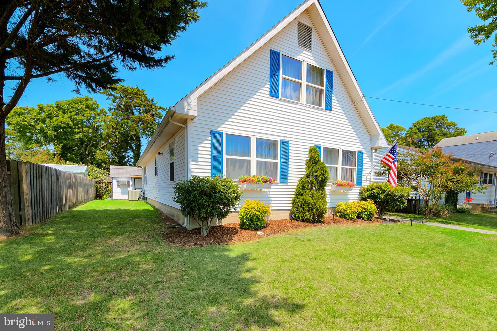 Tucked away on a quiet street in the sought-after Bay Vista community, this charming Salt Box home offers the perfect blend of coastal tranquility and everyday convenience. Featuring 4 bedrooms and 2 full bathrooms, the home is thoughtfully designed with a main-level bedroom and full bath, making it ideal for guests or easy first-floor living. The bright and airy living room welcomes you with abundant natural light, while the kitchen flows seamlessly into the dining area—perfect for gathering with family and friends. After a day at the beach, rinse off in the outdoor shower before relaxing on the screened porch, an ideal setting for classic crab feasts and warm summer evenings. Additional highlights include a storage shed outfitted with electric, workbench, shelving  and a window air conditioning unit, making it a terrific workshop, as well as a private driveway with parking for two vehicles, and a peaceful location that feels tucked away from it all while remaining just minutes from the best of the Delaware coast. 
Downtown Rehoboth Beach is only a five-minute drive away, placing boutique shopping, acclaimed restaurants, entertainment, and the famous boardwalk within easy reach. Spend your days enjoying miles of beautiful shoreline for beachgoing and boating, or explore nearby outlet shopping and local attractions—all just a stone's throw from your front door. Whether you're searching for a year-round residence, vacation retreat, or investment opportunity, this inviting coastal home with no HOA to restrict you is ready to help you make the most of life at the beach.