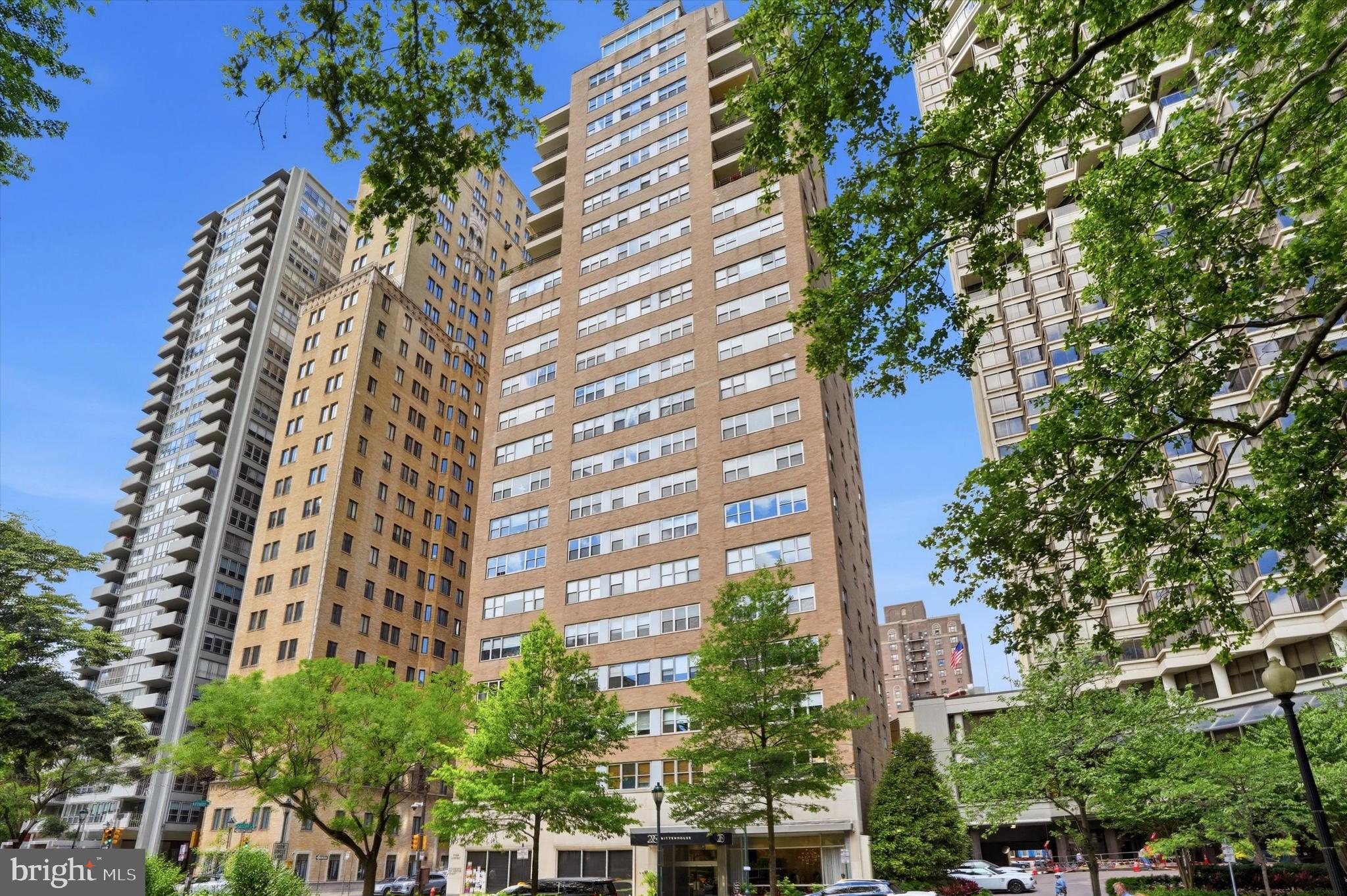 Welcome to Unit 5D at 220 W. Rittenhouse Square, a beautifully updated one-bedroom, one-and-a-half-bath residence with views of the west side of Philadelphia's most iconic park.

A gracious foyer leads into a spacious living and dining area, with oversized windows. Newly installed maple hardwood floors run throughout the home, adding warmth and sophistication. A dedicated office nook offers flexibility for working from home or an additional seating area. Thoughtfully designed custom closets and built-in storage solutions maximize functionality and provide exceptional organization throughout.

The kitchen is both stylish and practical, featuring wooden cabinetry, granite countertops, stainless steel GE  and Whirlpool appliances, and an in-unit Electrolux washer and dryer. An oversized storage closet adjacent to the kitchen serves as an ideal pantry or additional household storage space.

The generously sized bedroom enjoys peaceful southern exposure and features motorized blackout shades, multiple custom-built closets, and an abundance of storage rarely found in condominium living. The renovated full bath is beautifully appointed with granite countertops, an oversized vanity, tile flooring, and a seamless glass shower with a built-in bench. A separate, updated powder room adds convenience and is a highly desirable feature seldom found in one-bedroom residences.

Residents of 220 W. Rittenhouse Square enjoy a 24-hour concierge, gym, and additional basement storage. Just outside your door are the renowned restaurants, cafés, shopping, and green space that make Rittenhouse Square one of Philadelphia's most sought-after neighborhoods, including favorites such as Borromini, Rouge and Via Locusta. With elegant interiors, modern updates, and an unparalleled location, Unit 5D presents an exceptional opportunity to enjoy sophisticated city living in the heart of Philadelphia.