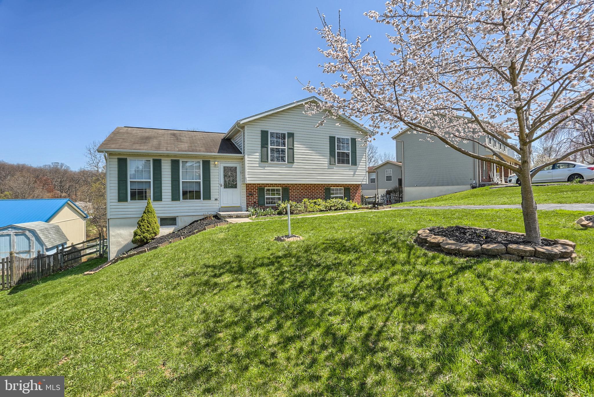 New Carpet throughout !  Spacious 4 level split with 3 bedrooms 2.5 baths, family room with gas fireplace features a walk out to fenced yard.  Freshly painted.  New carpet on order.  Living room and kitchen level with breakfast bar, stainless appliances, and deck.  Master suite.  Unfinished lower level features laundry and a walk-out to an attached utility shed.  Great for tools or dogs.