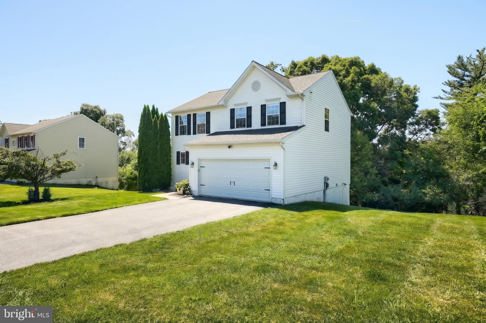Welcome home to this beautifully maintained one-owner Colonial in the desirable Lakeview Heights community of Spring Grove! Offering 3 bedrooms, 2.5 baths, and a location that's hard to beat, this home is within walking distance to schools—making morning drop-offs, after-school activities, and community events incredibly convenient.
Freshly painted throughout, the home features a bright and functional floor plan designed for modern living. The spacious kitchen includes a center island and opens to a comfortable living room highlighted by a cozy gas fireplace.
One of the home's most sought-after features is the second-floor laundry, conveniently located near all bedrooms, eliminating the need to carry laundry up and down stairs. The primary suite offers a private bath and generous walk-in closet, while two additional bedrooms and a full bath complete the upper level.
The partially finished walk-out basement adds valuable living space and flexibility for a family room, recreation area, home office, fitness space, or hobby room. With direct access to the backyard, it offers both functionality and future possibilities. Step outside to the low-maintenance 12' x 10' Trex deck, perfect for relaxing or entertaining guests.
Additional amenities include a two-car garage, practical mud room entry, ample storage, and pride of ownership throughout. Move-in ready, quick settlement and ideally located, this home combines comfort, convenience, and additional living space in one exceptional package.