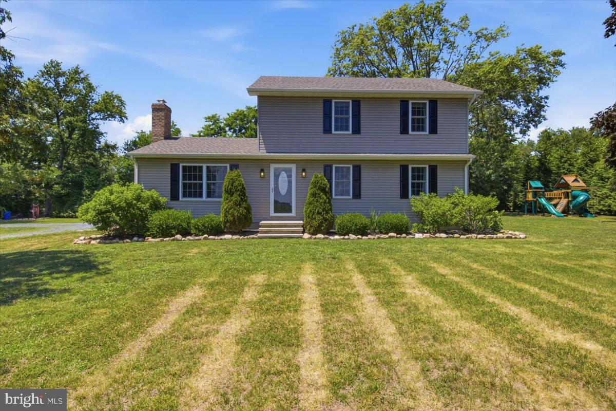 Welcome to 25428 Worton Lynch Road in Worton, Maryland! Situated on 1.28 acres, this charming 3-bedroom, 2.5-bath home offers comfortable living with thoughtful features throughout.

The heart of the home is the kitchen, featuring granite countertops, LVP flooring, and ample cabinet space for cooking and entertaining. Just off the kitchen, the inviting living room boasts beautiful hardwood floors, a shiplap accent wall, and an electric fireplace that creates a warm and welcoming atmosphere. A convenient half bath is also located on the first floor for guests.

The spacious first-floor primary suite provides a private retreat with a large walk-in closet, a hidden closet for additional storage, and an ensuite bathroom complete with a tiled shower. Upstairs, you'll find two additional bedrooms with carpeting and a full bathroom, offering comfortable space for family or guests.

A full basement with a wood stove adds valuable storage, workshop potential, or future finishing possibilities. Outside, enjoy the peaceful setting from the rear deck overlooking the 1.28-acre property. Additional features include a shed with a concrete pad and a swing set that conveys with the sale.

Offering the perfect blend of comfort, space, and country charm, this Worton property is ready to welcome its next owners home.