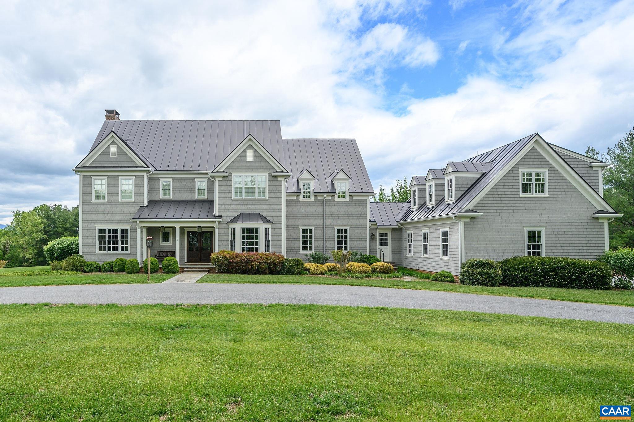 This premium, totally custom home in Ivy?s coveted Far Hills neighborhood is beautifully sited on over 3 open acres with permanently conserved views. There is an ideal balance of formal and informal living spaces, a huge eat-in kitchen open to family room, excellent light, high ceilings, extensive trim-work and great flow for casual living or entertaining. You'll find ultra high quality finishes and systems throughout including bluestone terraces, lovely hardwood floors, geothermal HVAC, and 2 Tesla chargers in garage. With 5 bedrooms and 4.5 Bedrooms in the home, plus a fabulous apartment/suite above the garage, this property truly checks all of the boxes. Expansive level and gently sloping lawns with access to trails.,Glass Front Cabinets,Granite Counter,Fireplace in Family Room