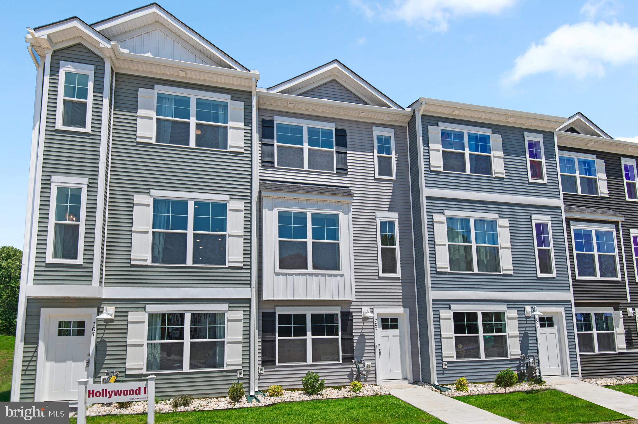 Up to $15,000 in builder incentives!* Welcome Home in the Final Phase of Holly Oaks! These Townhomes, owned as Condominium style, offer you low/no maintenance living with 2- 1st floor bedrooms (optional) and addtl laundry- Bring the Family! This 4 bed 3.5 bath offers ample room to spread out while having a nice open flow. On the main living level, a gorgeous kitchen greets you with an oversized island, staggered upgraded cabinets, quartz countertops, stainless appliances. All the way up, you'll enjoy the final 2 spacious bedrooms- 1 being the owners suite with tray ceilings and an impressive ensuite with dual vanity, quartz countertops and a glass enclosed ceramic tile shower. This home is perfectly positioned only minutes from the APG gates as well as minutes off I95 for the commuters. This is an awesome opportunity worth checking out! Schedule your private tour today!