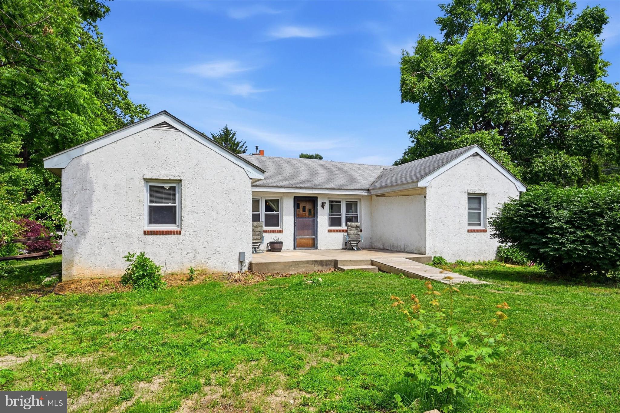 Set on a level 1.6-acre lot, this 3-bedroom, 1-bath ranch offers space, privacy, and plenty of potential. The spacious living room features a wood-burning brick fireplace, creating a warm focal point for gathering and relaxing. An eat-in kitchen provides a functional layout ready for your personal updates and improvements.

The home includes a full unfinished basement with a separate laundry area and exterior access, offering ample storage and future possibilities. Outside, a detached garage and expansive yard provide plenty of room for outdoor activities, gardening, or additional enhancements.

This property presents an excellent opportunity for buyers looking to add value and make it their own. Enjoy a peaceful setting surrounded by countryside, while remaining conveniently located near community parks, shopping, and major roadways. The property is being sold as-is.