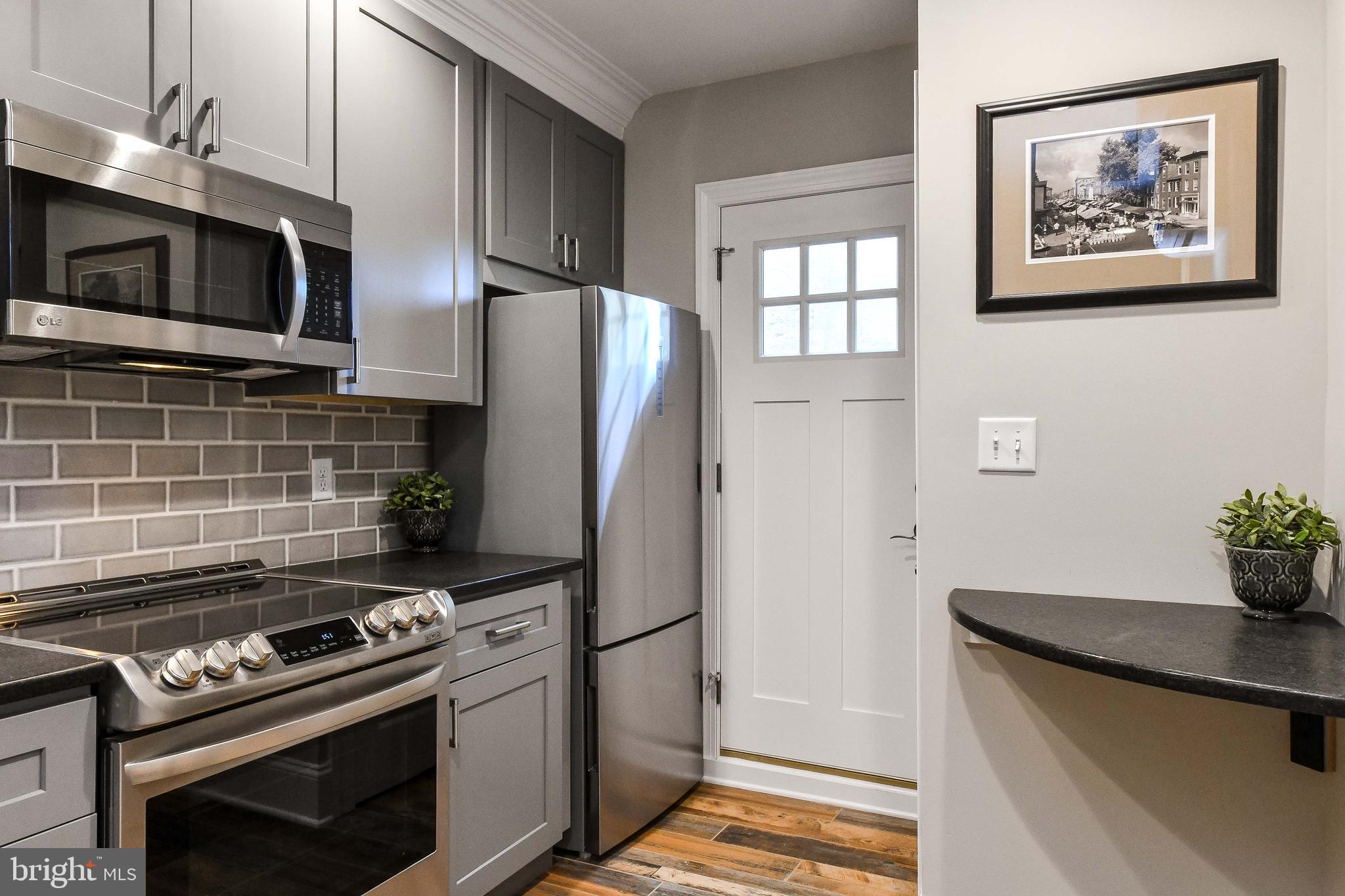 Welcome Home, Motivated Landlord!!! Perfectly Located 1 Bedrooms, 1 Full Bathroom Lower Level Unit in Federal Hill! This Unit Offers Open Floor Plan, Stacked Washer & Dryer, Murphy Bed Built-In , Living Space, Kitchen With Stainless Steel Appliances, Electric Stove, Microwave, Tray Ceilings, Rear Patio With Table & Chairs, & Much, Much More! OFFERED FULLY FURNISHED!!! WALK TO INNER HARBOR AND CAMDEN YARDS AND M&T Stadium.
