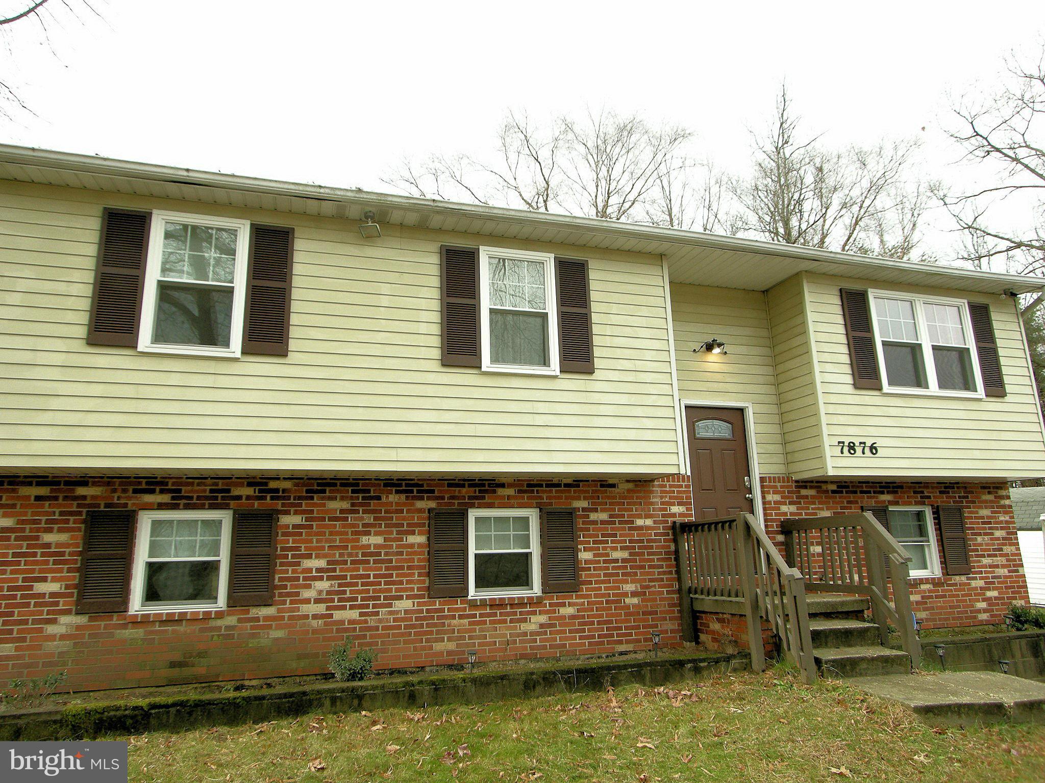 Bright and spacious! Stylishly updated bathrooms and kitchen with maple cabinets,granite counter-tops, stainless steel appliances, and ceramic tile floors, and vinyl windows. Gleaming wood floors on the main level. Separate dining room w/ sliding doors to a huge deck and large fenced yard, perfect for entertaining.Fully finished,walk-out lower level with lots of sunlight and full bedroom/bathroom.
