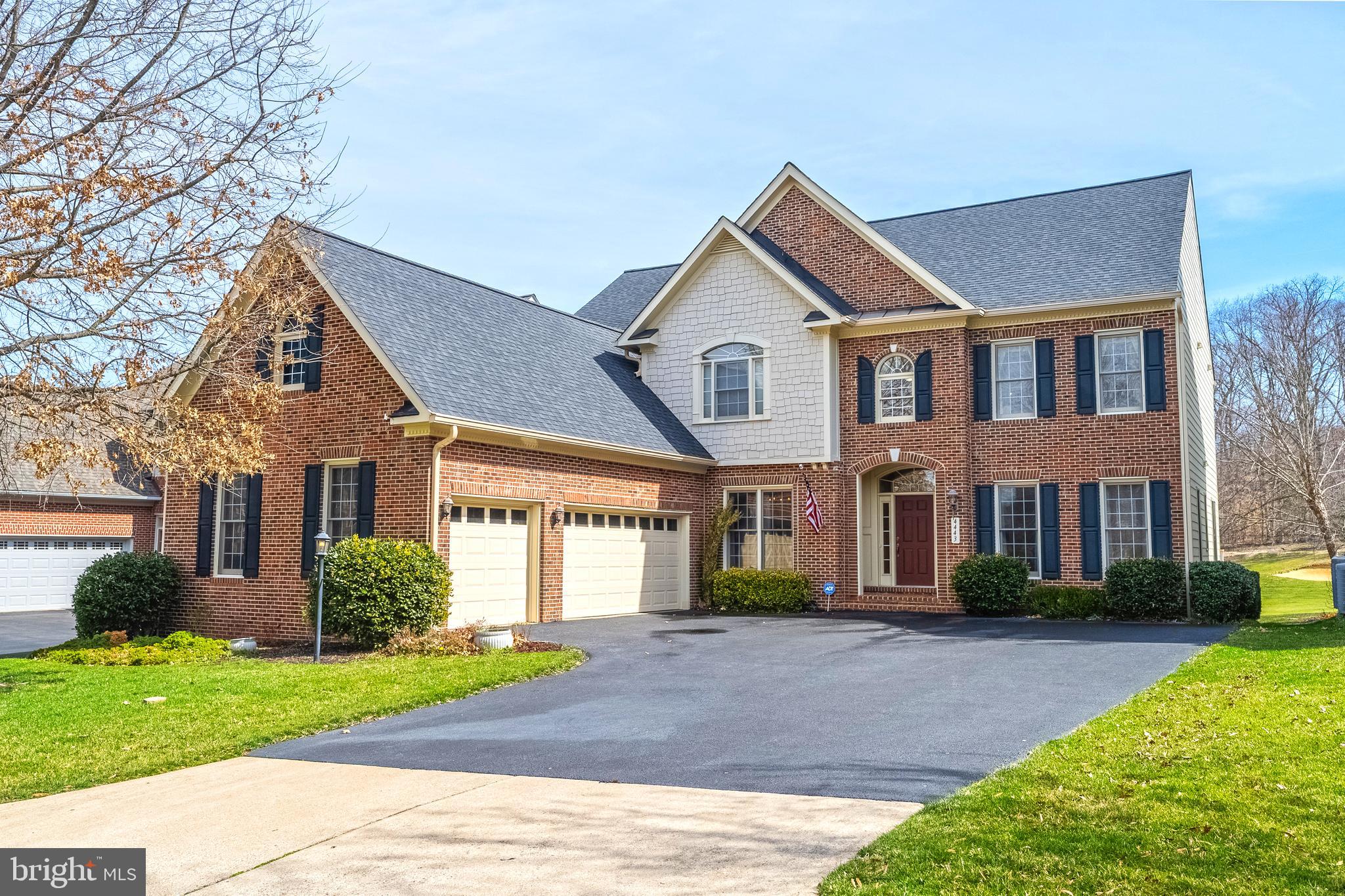 Nestled amidst lush greens and rolling fairways, this luxury home located on the 8th fairway offers a unique living experience.  A Craftmark Homes design with 3-car garage, brick and hardiplank colonial and elegantly appointed lending more than 5500 sq. ft. of living.  The impressive two-story foyer is flanked by a sitting room and separate dining room.  Hardwood flooring throughout the main level and travertine tile kitchen and mud hall.  Overlooking the family room and breakfast area of floor to ceiling windows is the gourmet kitchen featuring a center island with a 6-burner gas cooktop, double wall ovens, 42” natural cherry cabinets, granite countertops, stainless appliances and ample pantry storage.  With the fairway views, you might be motivated to wrap up your workday early or just enjoy the nature views from the main level office/den with built-in’s.  The owner’s suite features a private sitting room with gas fireplace, an ensuite bath with dual vanities, soaking tub, separate shower, and extensive walk-in closet.  Laundry is located on the upper level along with three ample bedrooms – two that share a hall bath with double vanity and one bedroom with ensuite bath, all boasting walk-in closets.  Daylight filled walk-out lower-level family room with stone gas fireplace offers space for exercise, movie or game nights.  The lower-level 5th bedroom with ensuite bath and walk-in closet has access to a covered stone patio to enjoy a favorite beverage and a quiet, shaded retreat.  Stairs lead to the upper composite deck accessed from both the family and breakfast rooms.  Expansive utility room offers tons of additional storage options.  Recent improvements include, GE refrigerator & dishwasher (‘23), new asphalt driveway and sealing (‘21), lower HVAC system (‘17), new insulated garage doors (‘17), 50-yr. architectural shingle roof and upgraded gutter system (‘20).  Enjoy the amenity-rich community of River Falls featuring basketball and tennis courts, outdoor pool, tot lots, trails, and 18-hole championship Old Hickory Golf Club & restaurant.  Minutes to restaurants and shopping, Old Town Occoquan, 11m to VRE and 7m to Omniride Transit Center.