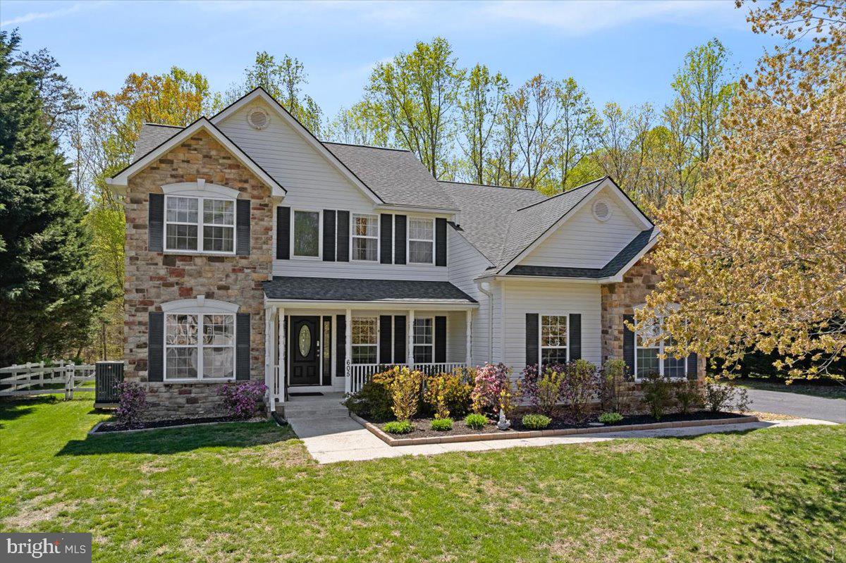 5 BEDROOM, 3.5 BATHROOM BEAUTY! This incredible home is located in the popular Marley Run neighborhood of Huntingtown, MD. Situated on a level lot that backs to wooded property, this home offers the perfect blend of comfort, space, and privacy - complete with a full front porch, side-load garage, and a backyard oasis with an in ground, salt water, heated pool!

Step inside to a spacious and open floor plan featuring formal living and dining rooms, a sizable and open family room and a versatile main-level office - ideal for working or learning from home. The chef’s kitchen is a showstopper, featuring an enormous granite island with raised overhang and bar seating.  Off of the kitchen there is a morning room extension, which is perfect for an additional dining and seating area. You do not want to miss the walk-in pantry, an ideal addition to this amazing kitchen!

Upstairs, you’ll find 4 generously sized bedrooms and 2 full baths, including a hall bathroom for bedrooms 2 & 3, with direct, private access to bedroom 4. The luxurious owner’s suite shines with a private sitting room, an enormous walk-in closet, and an elegant bathroom featuring dual vanities, a soaking tub, and a separate stand-up shower. The cherry-on-top is the fully finished lower level, which adds even more living space - with a large recreation room, a 5th bedroom, and a full bathroom.  A standout feature of this space is the lower level kitchen area! This is the perfect place for guests as well as the ideal setup for secondary living quarters.  

Outback is a private paradise all its own with a beautiful in ground, filtered and heated pool. Enjoy the panoramic, wooded views by the poolside or relax on the beautifully hardscaped patio area. LOCATION, LOCATION, LOCATION! 605 Marley Run is located in a top ranking school district and within close proximity to major commuter route 2 and 4.  Now is your change to make this exceptional home all yours! Mark your calendars, this home is coming soon!