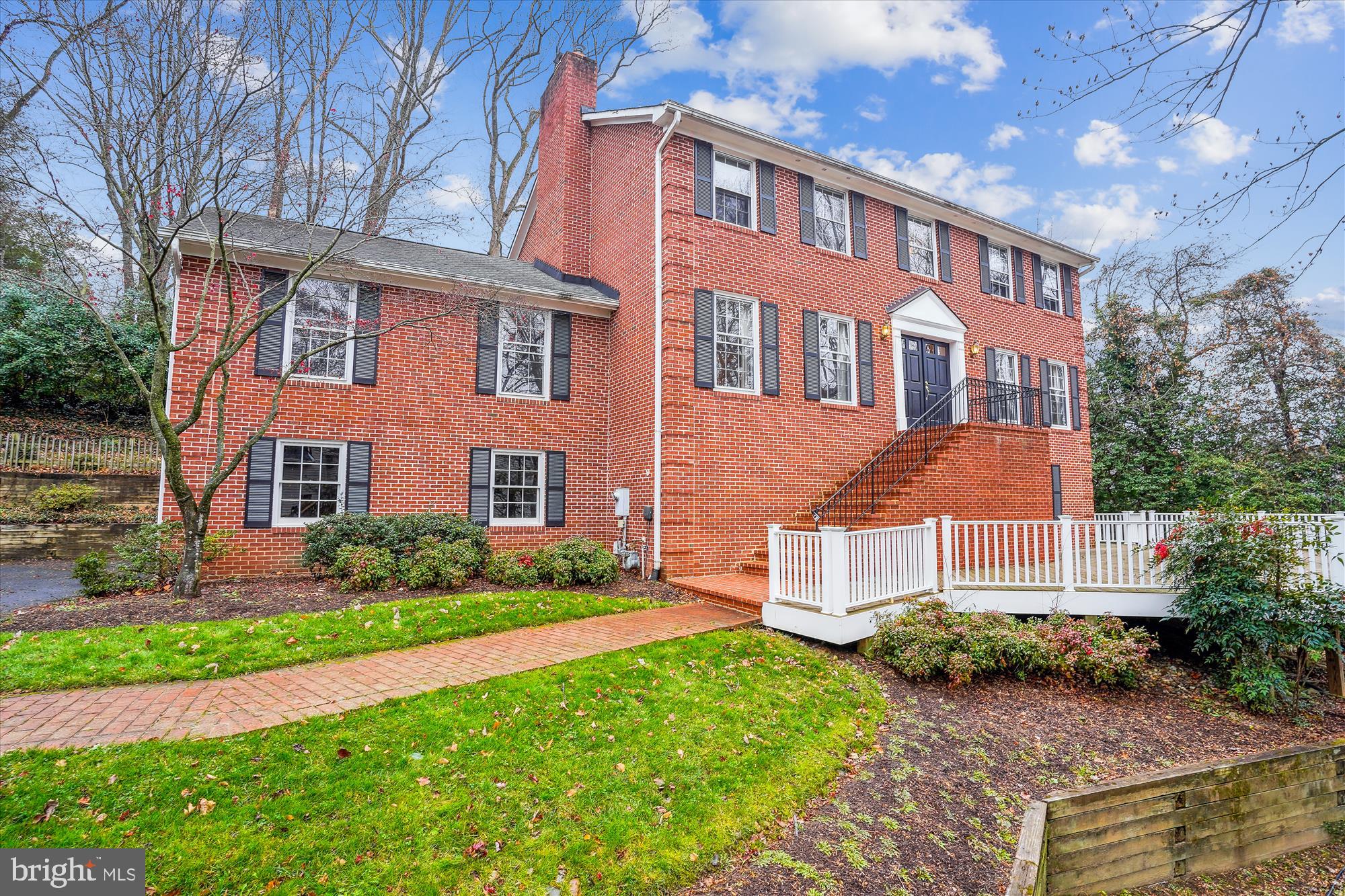 *Discover the potential of this spacious 5-bedroom, 3.5-bath brick colonial, perfectly situated on a picturesque .45-acre lot in the highly sought-after Chain Bridge Woods neighborhood. Tucked away on a quiet cul-de-sac, this home offers over 4,000 sq. ft. of living space across three levels—ready for your personal touches!  Step inside to find gleaming hardwood floors and an elegant main level featuring a sunlit living room with a cozy fireplace, a formal dining room with charming wainscoting and crown molding, and a bright kitchen with a breakfast nook and a scenic picture window. The expansive family room opens to a large deck, creating the perfect space for indoor-outdoor entertaining. A convenient laundry room with ample storage and a half bath complete this level.  Upstairs, the primary suite boasts a generous walk-in closet and a private bath. Three additional spacious bedrooms share a well-appointed hall bath.  The walkout lower level offers incredible versatility, featuring a recreation room with a second fireplace, a 5th bedroom with a full bath, and an additional office/exercise room—ideal for remote work or a home gym.  Outside, a charming front deck and a 2-car attached garage add to the home’s appeal. Enjoy an unbeatable location just minutes from downtown McLean and Tysons, with quick access to major commuter routes. Served by top-rated Chesterbrook, Longfellow, and McLean schools!