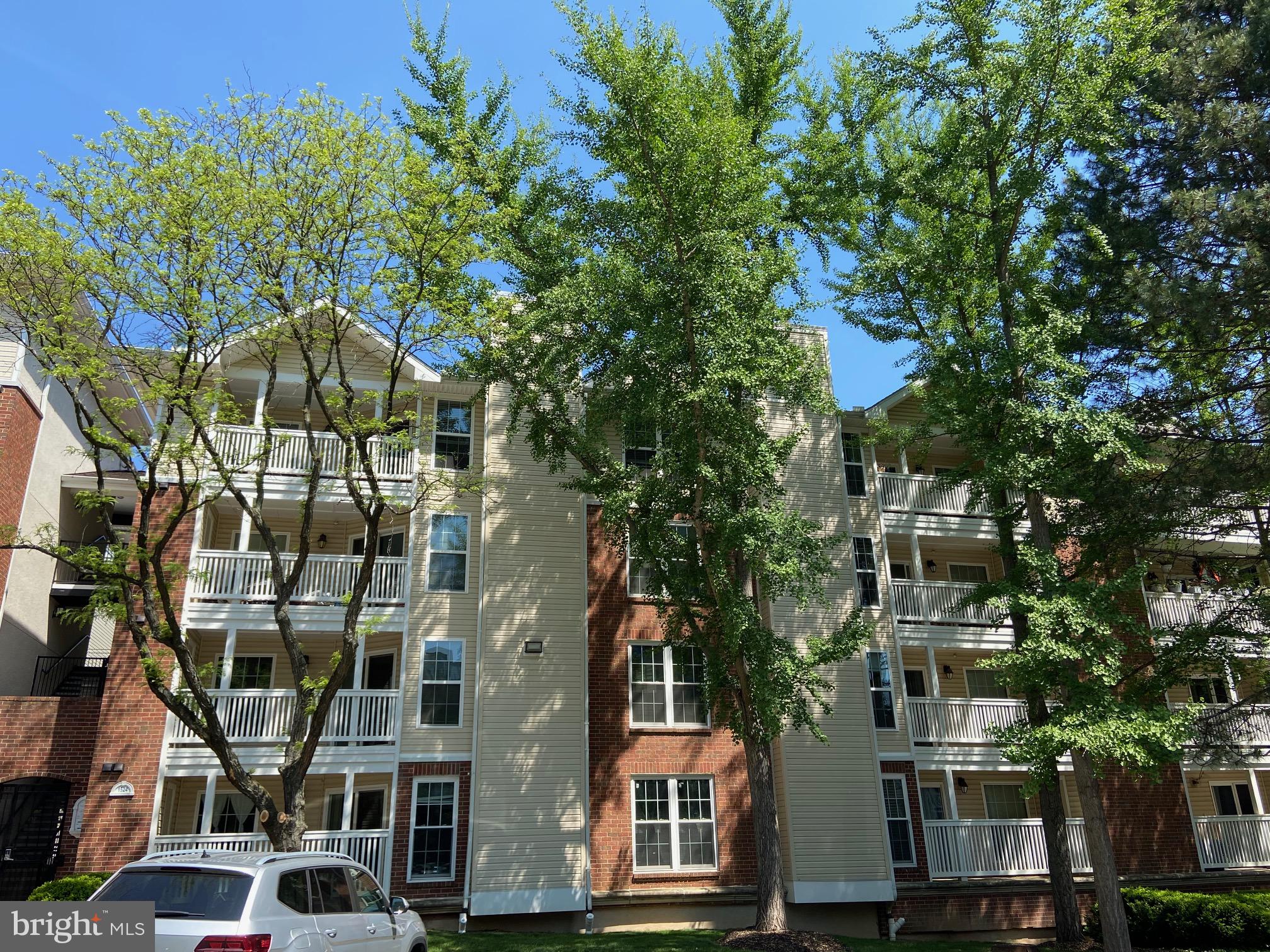 Very last Opportunity - Or it will be leased. This is in the heart of Tyson's Corner! This is seeking after Fountains of McLean! You walk to so many shops and restaurants. Minutes to Galleria, 2 metro stations, The Boro, and easy access to Dulles Toll Road, Route 7, and Route 123. Beautiful south facing condo with new HVAC (2025), brand new Luxury Vinyl Plank (LVP), and fresh paint all over. Kitchen with granite counter top and stainless steel appliances. Full sized washer and dryer in unit. Two coat closet by the front door. Spacious dining and living areas. Large balcony with large sliding doors facing courtyard with green trees and also storage. Two way access to bathroom. Three parking available - one reserved in the garage, one reserved in the yard, and one visitor parking permit. Fantastic community amenities including a clubhouse, outdoor pool, game room, fitness center, and sauna.