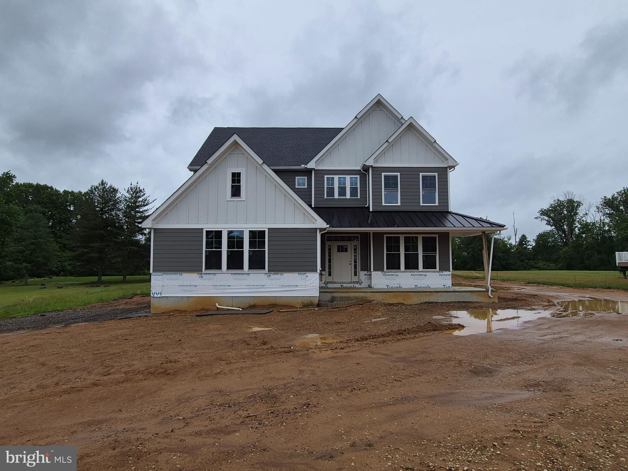 NEW CONSTRUCTION IN NEWTOWN SQUARE! This 4 bedroom, 2.5 bathroom home sits on a recently subdivided flag lot of approximately 1-acre set back from the road for added peace and privacy. The main level includes a 2-story foyer entry, office/den/dining room, powder room, mud room from the garage entry, and large open eat-in kitchen and adjacent great room. The kitchen will include a butler's pantry, island with counter, and room for a table. The great room will have a gas fireplace and 2 sets of double doors to the covered patio. The sleeping level features a huge owner's suite with dual walk-in closets and spa-like ensuite bathroom with dual sink vanity, water closet, and separate soaking tub and walk-in shower. All three remaining bedrooms include walk-in closets, plus there's a hall bath and laundry room. Additional features will include a finished basement with roughed-in plumbing for another bathroom, covered front porch, 2-car garage and driveway parking, landscaping, and lots of yard space. Please reach out if interested in owning a beautiful brand new home in the area!