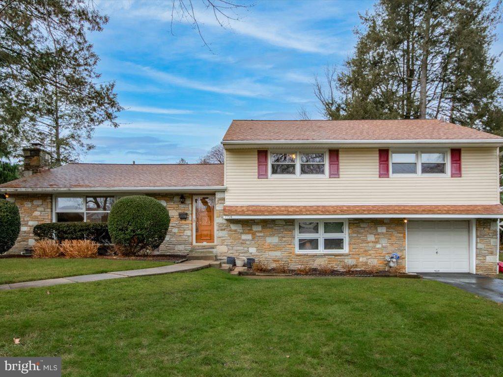 This large, well maintained 3-4 bedroom Split Level home is located on a cul-de-sac and is ready for you to move in. Some of the highlights are; the roof was installed in 2017- 50 yr shingle /transferrable 15 yr warranty on workmanship,  the Furnace  & AC was replaced in 2021 Carrier with a Service contract to Sept 2024, Replacement Windows, 2 gas fireplaces, glistening hardwood floors, Large kitchen with abundant cabinets and counters.  
There is plenty of living space in this neutrally decorated, light filled home.  There is a spacious living room and dining room with hardwood floors.  The eat-in kitchen has an abundance of cabinets and counter space and an outside exit to the upper patio. The lower level has a nice size family room with a gas fireplace, an additional large room that can be used as a bedroom or office.  There is a large closet just outside the bedroom and a powder room on the same level.  The utility room/ laundry room has another closet and outside exit to one of the patios.  There is also an exit to the garage. This home is spacious with lots of storage.
