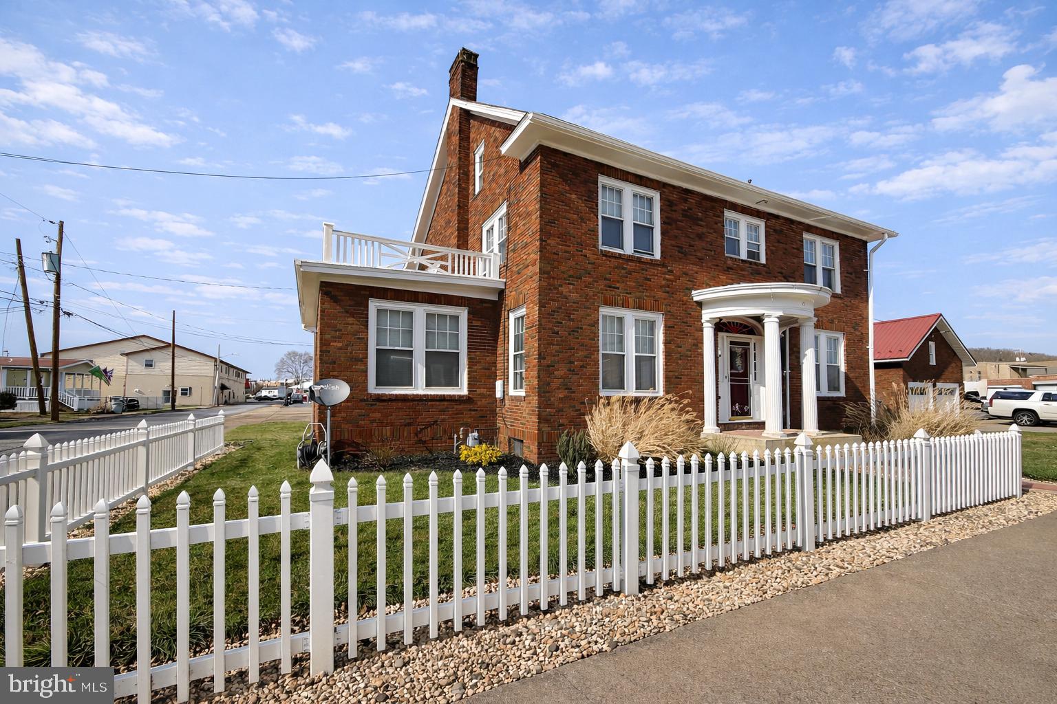 **OPEN HOUSE** Tuesday 6/2 5:30-7pmWelcome to this beautiful 1931 brick home located in the heart of Lock Haven—where timeless character meets thoughtful modern updates. With 5 spacious bedrooms and 2 full bathrooms, this home offers the perfect combination of size, charm, and functionality for families looking to grow or anyone in need of extra space.

From the moment you arrive, you’ll appreciate the care and investment that has gone into maintaining and improving this property. The home’s classic brick exterior is complemented by freshly painted trim and porches, along with rebuilt columns and structural porch updates, enhancing both curb appeal and long-term durability. Enjoy relaxing mornings or evenings outside on the new composite deck, while the additional porches have been resealed for extended life and low maintenance.

Step inside and you’ll immediately notice the warmth and character of hardwood floors throughout the home, creating a cohesive and inviting feel in every room. The interior offers a spacious layout with plenty of natural light, making it ideal for both everyday living and entertaining guests.

The kitchen has been updated with a brand new floor, providing a fresh and functional space for cooking and gathering. Additional interior improvements include recent painting and updates in the basement, adding usability and flexibility to the home.

A major bonus is the 2-car garage featuring a brand new metal roof, giving you added peace of mind and long-term value. Altogether, the seller has invested significantly in key upgrades, allowing the next owner to move in confidently without needing to take on major projects.

Located in a convenient area of Lock Haven, this home offers easy access to local amenities, schools, and everything the community has to offer—while still providing the space and comfort of a larger property.

This is a rare opportunity to own a large, character-filled home with meaningful updates already completed. Whether you’re looking for more space, a home with personality, or simply something move-in ready with long-term value, this property checks all the boxes.

Schedule your private showing today and come experience the space, charm, and potential this home has to offer.