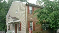 Over  2000 square feet of living space in this well cared for conveniently located end unit  townhome. Cozy fireplace located in the family room. Hardwood floors & updated appliances. Master suite with vaulted ceiling & spacious bath.  Finished basement including a full bath.  Two spacious decks for outside entertainment. Assigned parking and community pool.