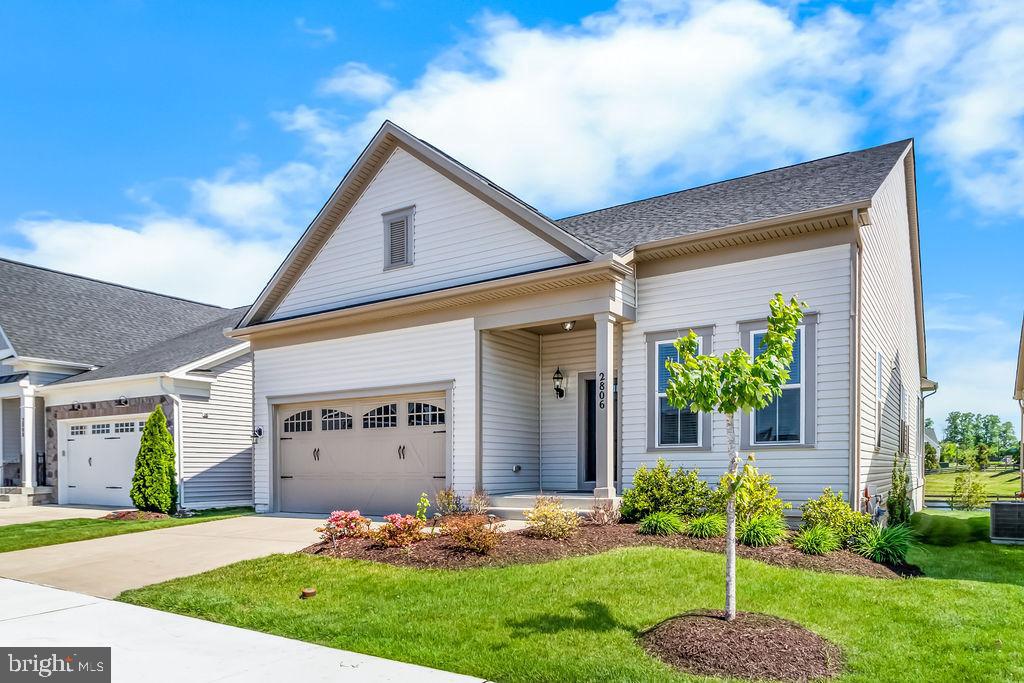 Stunning, like-new modern home in the highly sought after 55+ community of Two Rivers, where resort-style living meets everyday comfort and elegance.  
Airy 10 ft ceilings on main level, abundant natural light, and a thoughtfully designed open-concept floor plan perfect for both relaxing and entertaining.  A private home office provides the ideal work-from-home space (was designated a dining room by builder), gourmet kitchen is truly the heart of the home--featuring a large center island, granite counters, gas cooktop, double oven and convection oven, all stainless-steel Kitchen Aid appliances, and elevated designer light fixtures.
The spacious living room seamlessly flows to a screened porch overlooking a peaceful pond view, creating the perfect indoor/outdoor lifestyle experience. 
The main level offers convenient one-level living with three bedrooms, including a luxurious primary suite complete with two walk in closets and a spa inspired ensuite bath featuring dual vanities, shower, soaking tub and private water closet. Two additional bedrooms share a well-appointed hall bath.
The expansive lower level is designed for entertaining and family fun, offering a large recreation room with walkout access to the backyard, plus and full bath and  additional unfinished spaces with endless potential and possibilities ie. a media room, hobby space,  and/or additional bedroom 
Enjoy the unmatched lifestyle that Two Rivers offers including a spectacular clubhouse, indoor and outdoor pools, walking trails community garden, dog park, pickle ball and tennis courts, state of the art fitness center, yoga studio, cyber cafe, ballroom and tons of social activities
Conveniently located with easy access to Washington DC, Annapolis, and Maryland Eastern Shore.  Live your best life in one of the areas premier active adult communities.