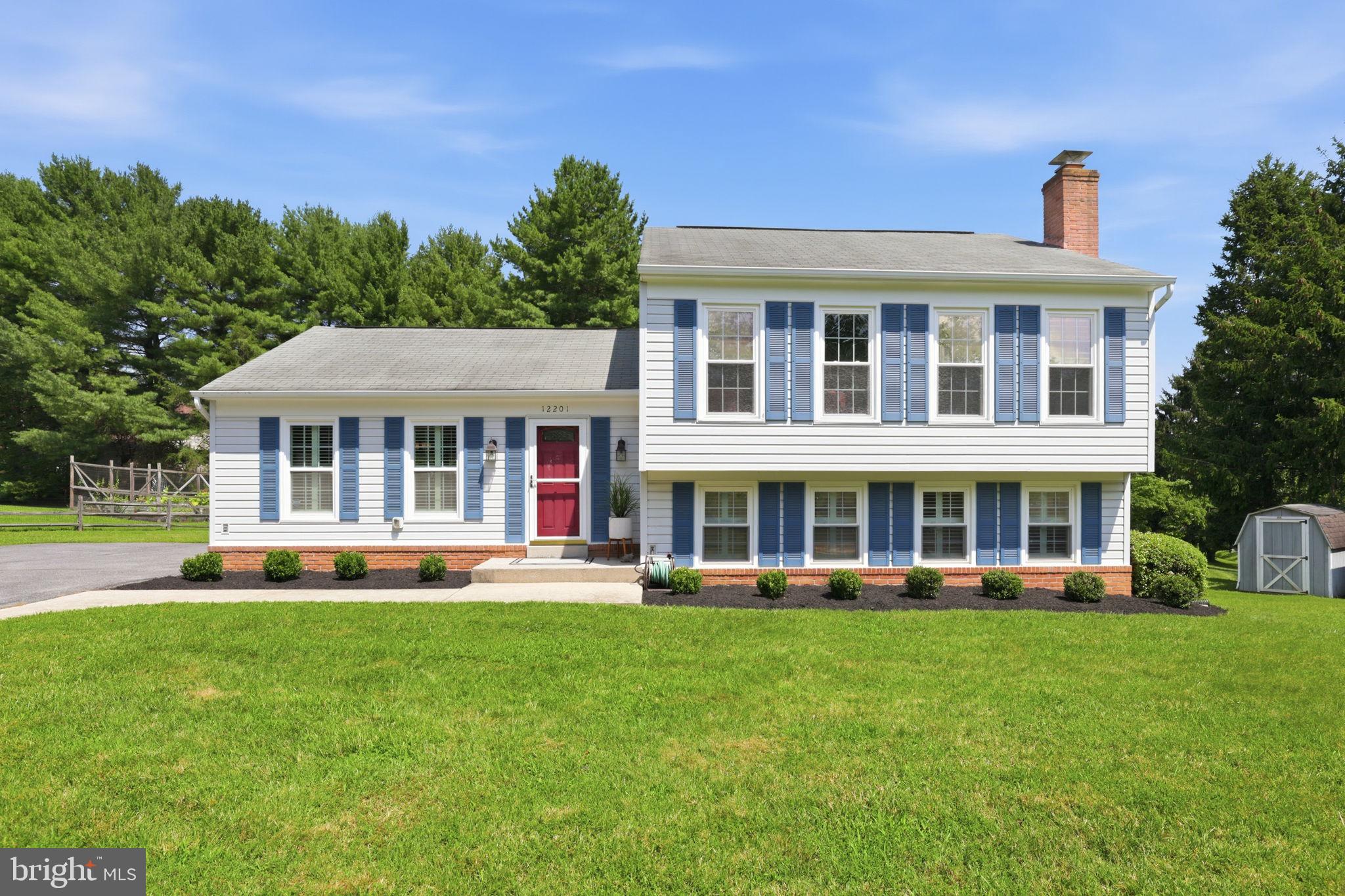 Discover the perfect blend of comfort, style, and modern living in this beautifully renovated split-level home, ideally situated in the sought after Mills Farm subdivision. Thoughtfully updated with a stunning kitchen and main living area renovation in 2017, this home offers an inviting living space designed for both everyday living and effortless entertaining. Step inside to an open-concept floor plan where the kitchen, dining, and living areas flow seamlessly together. The beautifully appointed kitchen is the heart of the home, featuring a spacious center island, sleek cooktop, oven, dishwasher, disposal, and plenty of workspace for cooking and gathering. Just off the main living area, an expansive deck extends your living space outdoors—perfect for morning coffee, summer barbecues, or relaxing evenings. The home offers three generously sized bedrooms and two full bathrooms, providing comfortable accommodations for family and guests. The fully finished lower level adds valuable living space with large windows, a separate exterior entrance, and a charming brick fireplace that creates a warm and welcoming atmosphere. Whether you envision a family room, home office, playroom, or media space, this versatile area can easily adapt to your needs. A conveniently located lower-level laundry room adds to the home's everyday functionality. Situated on a spacious half-acre corner lot, the property features an open backyard with plenty of room for outdoor entertaining, gardening, recreation, or simply enjoying the peaceful surroundings. Two storage sheds provide additional space for lawn equipment, tools, and seasonal items. Offering the tranquility of suburban living while remaining just minutes from parks, schools, shopping, dining, and other local conveniences, this exceptional home combines thoughtful updates, versatile living spaces, and an unbeatable location. Don't miss your opportunity to make this beautiful Mills Farm home your own!