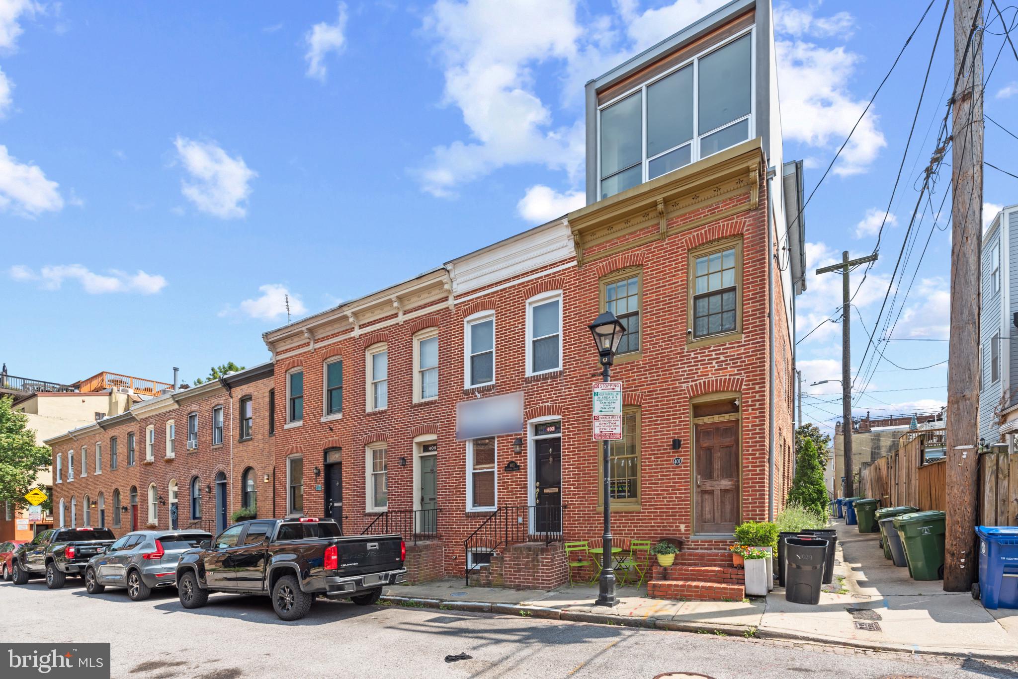 OH WHAT AN ADDRESS!  COME SEE THIS LOVELY HOME ON PREMIER  BLOCK IN HISTORIC FEDERAL HILL!  AMPLE SIZE MAIN LEVEL GIVES SPACE FOR FURNISHING AND EASY ENTERTAINING.  KITCHEN LEADS OUT TO PEACEFUL FENCED IN REAR PATIO.  LARGE BEDROOMS UPSTAIRS FLAUNT THEIR OWN EXCLUSIVE BATHS.  ROOF TOP DECK GIVES YOU CITY LIVING AT ITS FINEST.  STEPS TO THE PARK, A QUICK SKIP TO THE WATER FRONT AND AN EASY STROLL TO THE FEDERAL HILL'S HIP AMENITIES LIKE CROSS STREET MARKET, STADIUMS, RESTAURANTS AND MORE!!!  COME SEE TODAY!