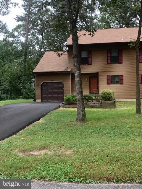 YOU'LL ADORE LIVING IN THIS BEAUTIFULLY MAINTAINED DUPLEX RIGHT IN THE HEART OF WILDEWOOD! THIS SPACIUS HOME IS IN EXCELLENT CONDITION AND BEAMS WITH PRIDE OF OWNERSHIP FROM THE MOMENT YOU DRIVE UP.  THERE ARE MANY RECENT UPDATES WHICH INCLUDE FRESH PAINT, ALL NEW SS KITCHEN APPLIANCES, FRESHLY POWER WASHED AND SO MUCH MORE TO APPRECIATE. WITH  4 GENEROUSLY SIZED BEDROOMS THERE IS PLENTY OF ROOM FOR EVERYONE.  THE BEDROOM LEVEL BOASTS 2 FULL BATHS AS WELL.  THE WELL LIT OPEN FLOOR PLAN ALSO HAS A WOOD BURNING FIREPLACE FOR THOSE COOL WINTER DAYS OR A SNUGGLY MOVIE NIGHT AT HOME AND A SEPARATE DINING ROOM.   THERE IS A HUGE SUN ROOM THAT LEADS TO A HUGE MAINTENANCE FREE DECK THAT OVERLOOKS THE TREES.  DON'T FORGET ABOUT THE ONE CAR GARAGE FOR "ALL THE STUFF" .  NICE CUL-DE-SAC LOCATION.