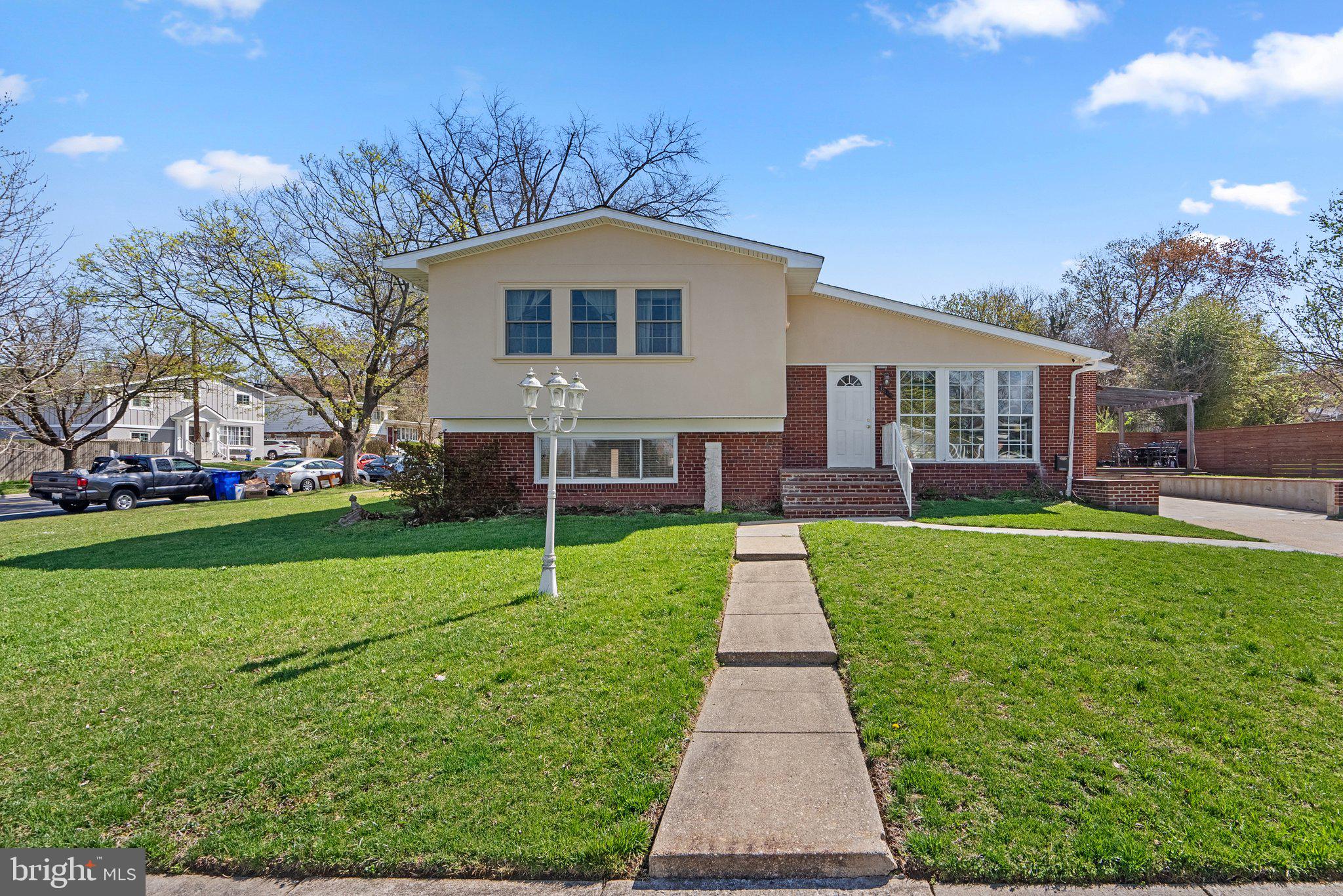 Welcome to 13131 Holdridge Rd, a beautifully maintained split-level home nestled in the highly sought-after Greenwood Knolls neighborhood of Silver Spring, MD. This charming residence sits on a spacious corner lot, offering both privacy and ample outdoor space. With a stunning stucco and brick exterior, this home exudes timeless curb appeal.

Boasting 5 generously sized bedrooms, 2 full bathrooms, and a convenient half bath, this home is perfect for both entertaining and everyday living. Step inside to find an abundance of natural light flooding the open and inviting spaces. The beautiful eat-in kitchen is a standout feature, with plenty of room for family meals and gatherings. The home also includes a composite deck, ideal for outdoor relaxation and enjoying the serene surroundings.

The lower level offers even more flexibility with a fully equipped second kitchen, perfect for an au pair suite or as a potential apartment for extended family or rental income. This additional living space adds tremendous versatility to the home.

Additional highlights include off-street parking, a Navien tankless water heater for on-demand hot water, and a high-efficiency Bosch furnace, ensuring comfort and efficiency throughout the year. With its thoughtful updates, expansive layout, and ideal location, 13131 Holdridge Rd is the perfect place to call home. Don’t miss the opportunity to make this beautiful property yours!