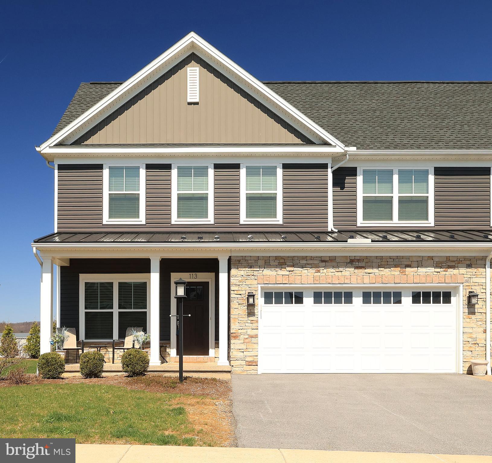 Easy living in Kingstown Village with easy access to Penn State University, the State College Regional Airport and retail and dining options. This lightly lived-in three-bedroom condo offers a large open floor plan with cathedral ceilings. On the first floor, there's space for a private home office, library or exercise room, first floor laundry, and a half bathroom for convenience. A kitchen with granite countertops and an island with seating provides extra counter space and storage, along with a large pantry closet. The primary suite features a walk-in shower, double bowl vanity, and spacious closet located on the first floor for convenience. Upstairs, there's a versatile loft space for additional study or office space and two full bedrooms with their own half bathroom and adjoining tub and shower. A full unfinished basement provides extra storage and is plumbed for a bathroom should you need more finished space to entertain or relax.
