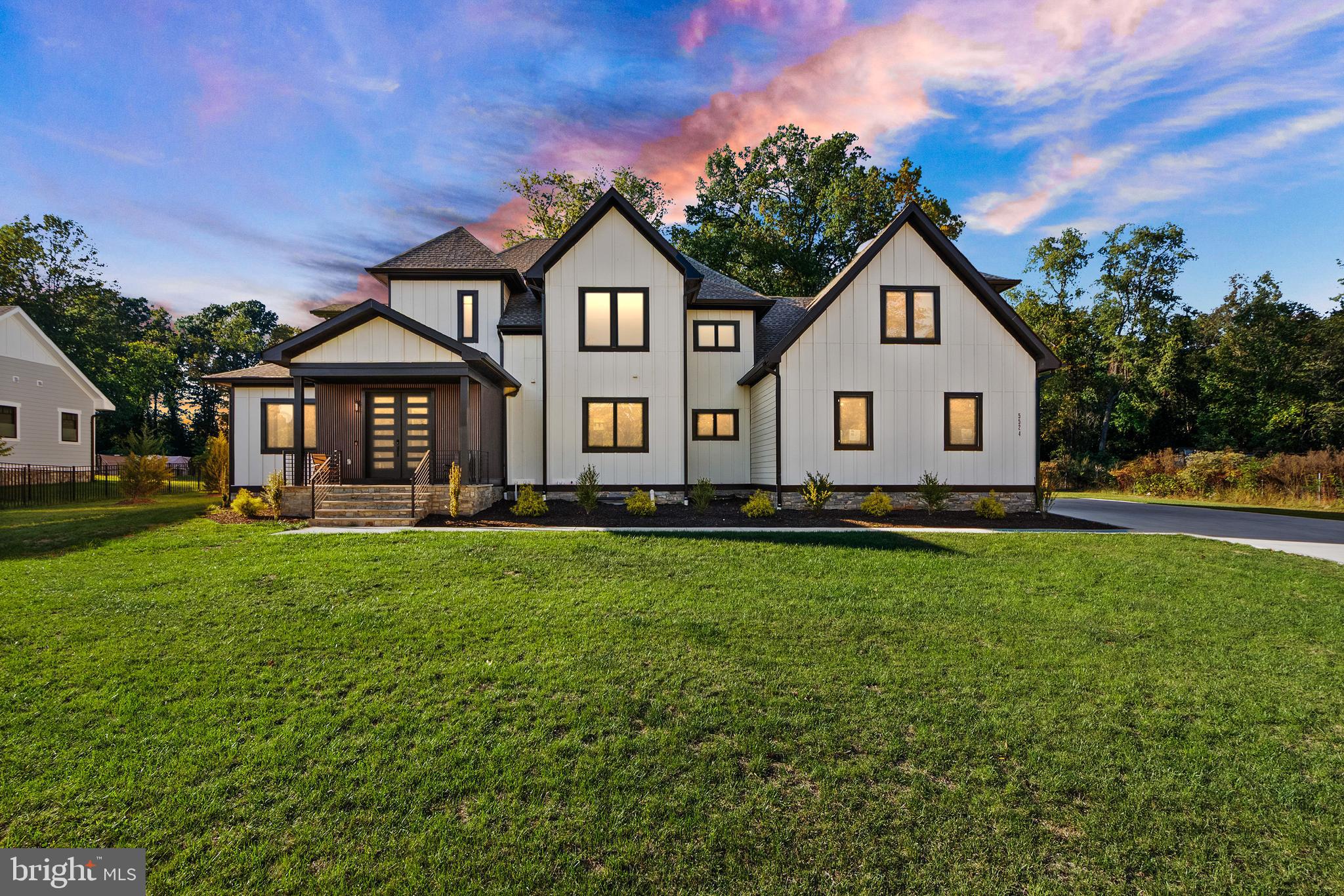 New Price! The Best Home of 2026 Hits the Market -Where Dream Meets Reality. Step inside and fall in love with this custom-built Arts & Crafts–style luxury home, designed to impress at every turn. Almost 8,900 total sqft! From the moment you walk up to the stone front porch, you’ll feel the quality and craftsmanship that make this home truly one of a kind. Light pours through beautiful casement-style windows, highlighting the open two-story foyer, white oak wood floors, gracious hallways, and soaring ceilings that create a sense of airiness and space. Top-of-the-line materials and premium finishes enhance every corner of this home. The main level offers two versatile bedrooms or offices, a powder room, and a warm family room that flows effortlessly into the spacious living and dining areas. The gourmet kitchen is a showstopper, perfect for hosting dinner parties or weekend brunches. Across all levels, you’ll find well-appointed bedrooms, most with a walk-in closet and en suite bathroom featuring smart-bidet toilets, offering comfort and privacy for everyone. The primary suite feels like a five-star spa, complete with a stunning bath that includes an oversized bathtub in the shower room and a ceiling heater for the ultimate luxury experience. The laundry room is so large and well-designed, it could double as a bedroom! (Can move washer/dryer from upper level to the basement hook-up). Down the hall, a wet bar and another family room provide another ideal hangout spot. The finished basement offers even more living space with a recreation area, an entertainment or gym room, a kitchenette, storage room and two additional bedrooms plus two walk-up accesses to the yard. Another laundry hook-up located in the basement as well. The home has a 30-year architectural shingle roof, Hardie Plank siding, and board-and-batten accents on the front. You have a rare 1.73-acre lot featuring two stone patios, one with a covered outdoor kitchenette for year-round entertaining. The three-car garage and expansive driveway has an electric car charger for extra convenience. Tucked away on a quiet no-thru street yet just minutes from Routes 29, 28, and 66, shopping, dining, and top-rated Powell Elementary School, this location perfectly balances privacy with convenience. Every inch of this home was built to inspire and to impress. No HOA. Don't forget to check out survey, video, reel, drone media, floor plan, 3D tour etc!