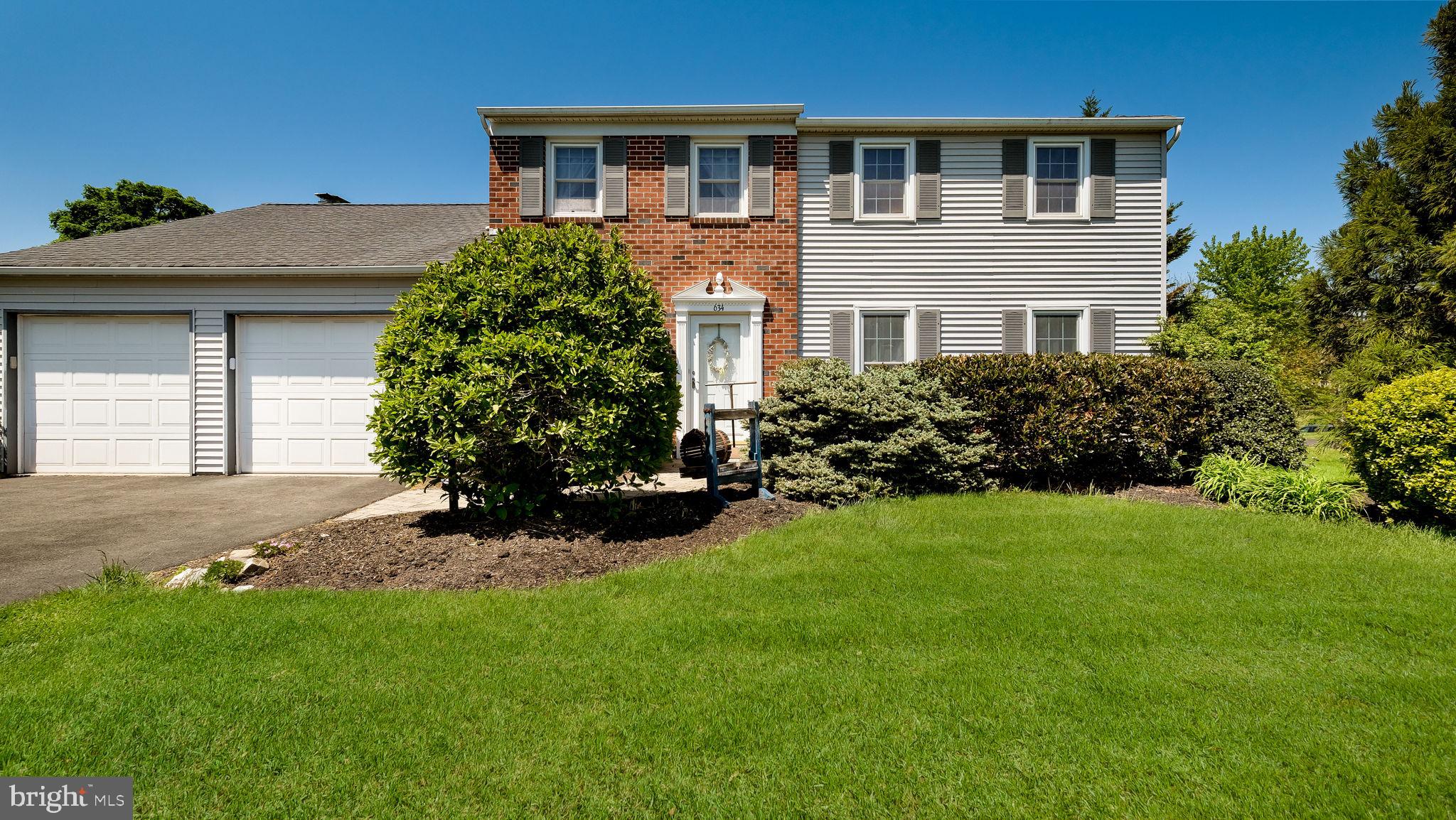 REDUCED! Location, Location, Location! It doesn't get much better than where 634 Conestoga Lane is located. This quaint, cul-de-sac street in Lansdale, PA is in the North Penn School District. 

A classic colonial offering 2,266 sq ft of well-planned living space on a .70-acre lot. The house and the grounds have endless possibilities. Bring your imagination and HGTV ideas! 

There's a slate-floored foyer that leads to a formal living room and a separate dining room enhanced by crown molding and chair rail. The custom kitchen features 42" cabinetry, granite counters, a double sink with gooseneck faucet, breakfast bar, recessed lighting, tile flooring, beautiful windows and double atrium doors that open directly to the backyard deck, creating a smooth indoor-outdoor flow.

Adjacent to the kitchen, the family room includes a brick wall with slate mantle fireplace and views of the rear grounds. A convenient powder room and access to the oversized two-car garage complete the main level.

Upstairs, you will find four well-proportioned bedrooms and two full bathrooms.

Outdoors, the property offers a maintenance-free deck, a paver hardscape patio, and a large, flat backyard. A large shed provides additional storage beyond the oversized garage.

Located in Towamencin Township with easy access to area roadways, shopping, and local services, this property combines a traditional layout with practical updates and a generous homesite. This lovely property is ready for its next owner.