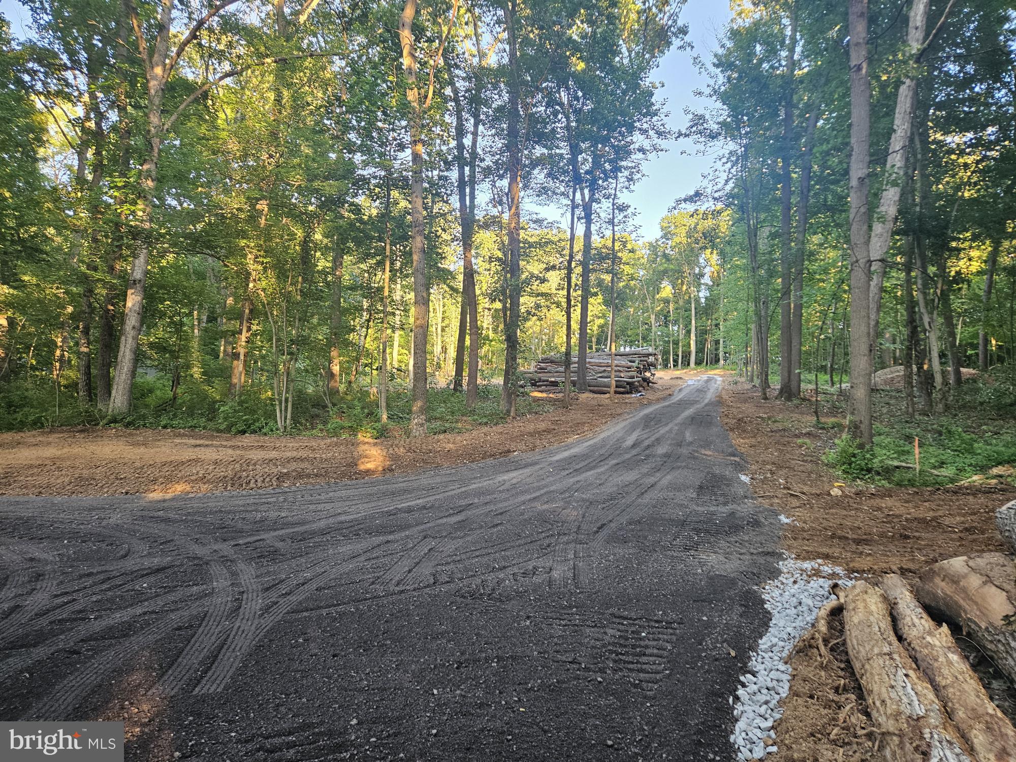 What a beautiful Private wooded setting!! towering mature  Hardwoods & various other species of Trees  Feels like you are in a Park, Peaceful quiet setting! , a wildlife Oasis ,  Feels like you are  far  far away and secluded, yet you are  are very close to all the  the Shopping , & Schools !!  What great site for your Dream Home!  Grab your Building plans  this Parcel will be ready to start building your dream home. There is an adjacent 3.5+ acre Parcel that will also be available in the near future if you would like to add on more buildable acreage . There is NO HOA and no restrictions!  
Conventional Septic system approved percolation test and  NOT a Sand mound  septic system so that saves you a lot of $$ . The Well has just been  installed it is 300foot deep with an excellent yield of 7.5  gallons per minute .  The Ag. transfer Tax has been paid previously so there is no additional Ag. Transfer tax  due so that saves you major $$$!! The lot slopes enough for a walk out Basement and great for lower level full bath with plumbing below the slab for gravity fed septic system. . Plenty of area for a large home site with large side load  attached garage .