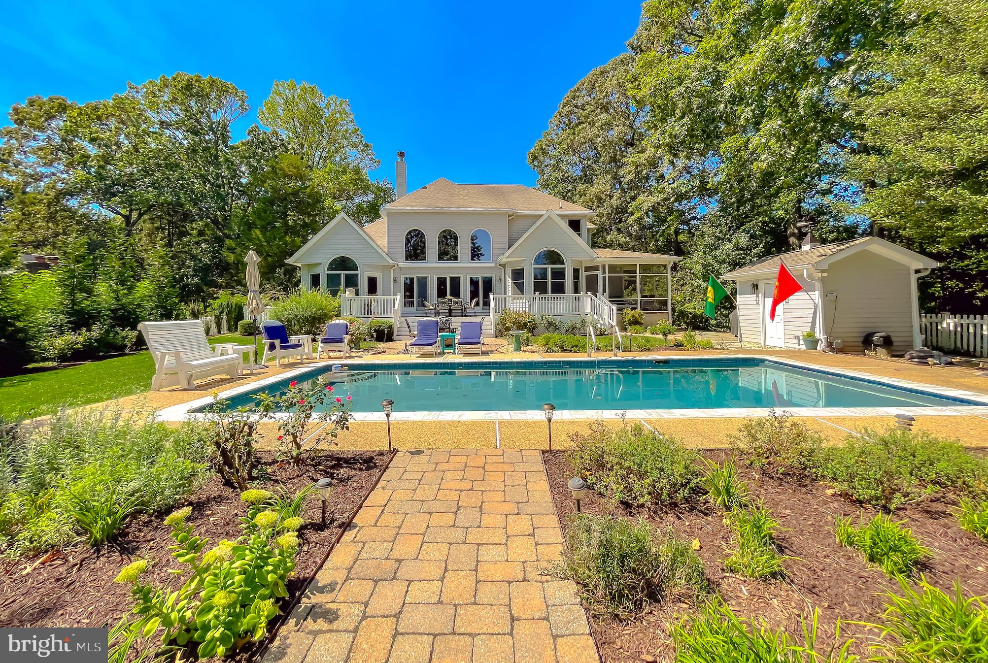 Welcome to Preston Point, a serene and secluded waterfront community featuring just over 25 exclusive properties. Nestled between Blunts Cove and Helen’s Creek, this prestigious estate offers an unparalleled waterfront lifestyle. Now available for sale on Preston Drive, this unique home is sure to impress even the most discerning buyer.

Perched on a prime lot with unobstructed views of Helen Creek, the property boasts deepwater slips accommodating vessels up to 45 feet. Upon entering, you’re greeted by a grand great room with 25-foot ceilings and gleaming hardwood floors. The main level offers expansive water views through atrium windows and sliding glass doors that lead to a deck overlooking the pool, pier, and scenic Helen’s Creek.

The gourmet kitchen is a chef’s dream, complete with an eat-in area and a separate formal dining room that comfortably seats 8 to 10 guests. The luxurious owner’s suite, also on the main level, features stunning creek views and an elegant ensuite bathroom with a soaking tub, shower, marble floors, and granite countertops. Additional amenities on the main floor include a versatile den, study, or office space.

Upstairs, you’ll find three generously-sized bedrooms, all with water views, along with a full bath. The lower level offers a spacious game room with a wet bar, a walk-out basement, and a separate bunk area perfect for overnight guests or family.

Outside, the meticulously landscaped grounds include a new riprap, retaining walls, a pool house, and a beautiful pool area. A few steps lead you down to the private pier. Properties in Preston Point are rare to come by, and this one is truly a hidden gem. Don’t miss the chance to make it yours—you won’t be disappointed.