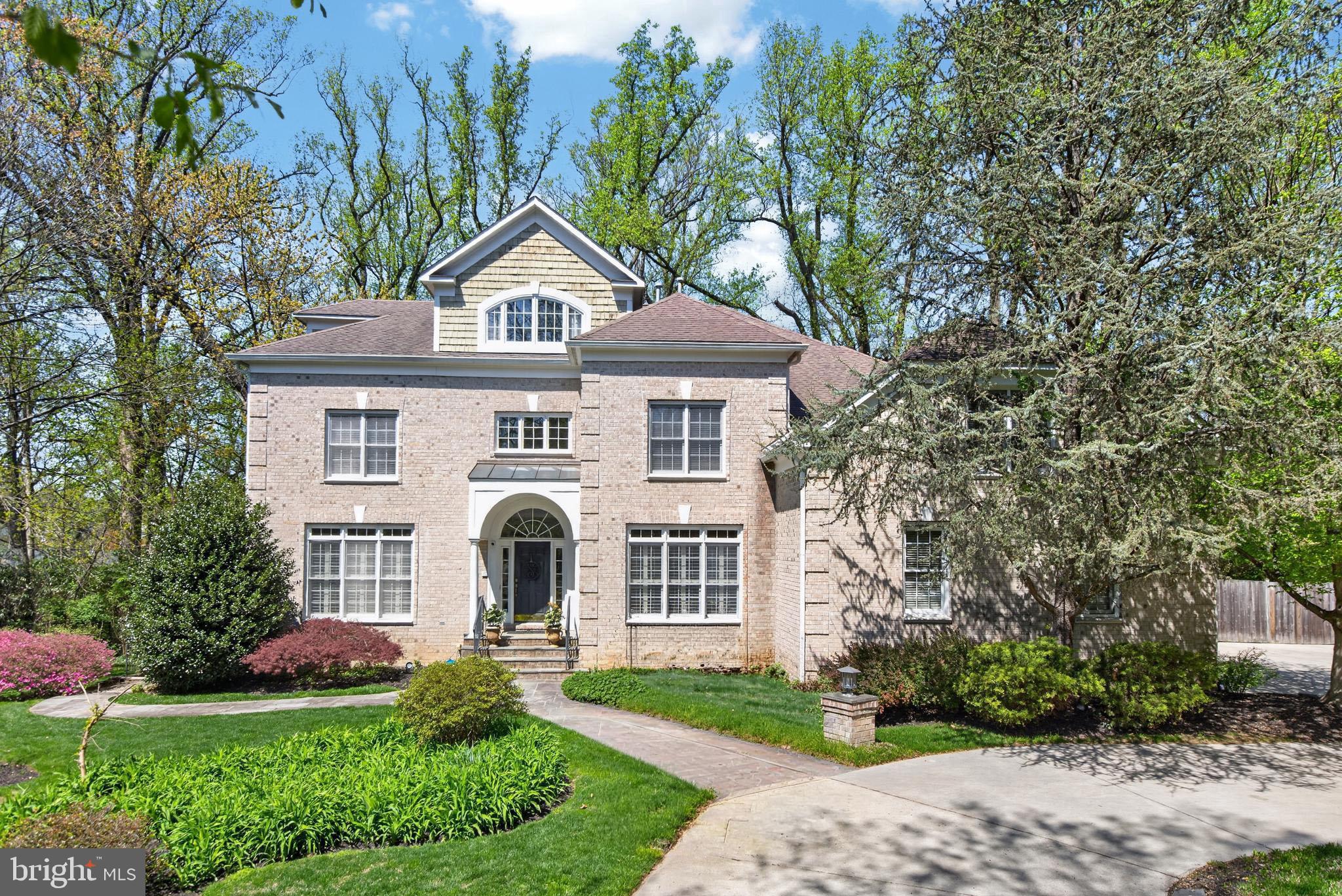 EXCEPTIONAL custom quality workmanship with a BRAND-NEW ROOF (2026) - Heated pool and spa on almost an acre of land - Multi generational living -  3 level elevator shaft in place for installation - Parking space for 11 cars including 3 car garage.

Tucked away at the end of a private lane and set on nearly an acre of beautifully landscaped grounds, this exceptional custom-built estate offers a rare combination of privacy, luxury, and flexibility in one of the area's most sought-after neighborhoods.

One of only four homes in an exclusive enclave, the property features a resort-style backyard rarely found in the neighborhood, complete with a heated pool and spa, covered outdoor living area, grilling deck, and multiple entertaining spaces. A gated entrance, circular driveway, and new roof (2026) further elevate the home's appeal.

Inside, four finished levels offer elegant yet comfortable living with soaring ceilings, hardwood floors, extensive millwork, and expansive gathering spaces. The gourmet kitchen opens seamlessly to the family room and breakfast area, while formal living and dining rooms, a private office, and thoughtful amenities throughout provide exceptional functionality.

The luxurious primary suite serves as a private retreat, complemented by spacious secondary bedrooms and flexible upper-level living space. The walk-out lower level is truly special, featuring recreation and entertaining areas plus a private multi-generational suite with its own entrance, fireplace, and separate living spaces—ideal for extended family, guests, au pair accommodations, or live-in support.

Additional highlights include a three-car garage, whole-house generator, built-in audio, central vacuum, irrigation system, and future elevator potential.

Offering a pool, nearly an acre of land, and a true separate living suite in this location is exceptionally rare. This is a home that delivers the space, lifestyle, and versatility today's luxury buyers are seeking—all just moments from shopping, schools, and Grosvenor Metro.