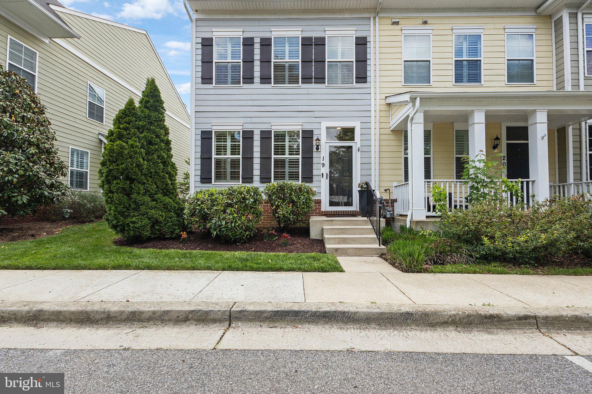 Nestled in the charming Boucher Place community, this exquisite end-of-row townhouse offers a perfect blend of coastal and traditional architectural styles, creating a warm and inviting atmosphere. Built in 2013, this residence boasts 1,800 square feet of thoughtfully designed living space, ideal for those seeking comfort and elegance. The kitchen is a chef's dream, featuring upgraded countertops, a spacious island, and high-end stainless steel appliances, including a gas range and built-in microwave. The combination of hardwood on the main level, throughout adds a touch of sophistication, while plush carpeting in the bedrooms ensures a cozy retreat. The home features three generously sized bedrooms, each designed with comfort in mind. The primary suite is a true sanctuary, complete with a walk-in closet and a luxurious en-suite bathroom featuring a tub shower. Enjoy the warmth of the gas fireplace in the family room, creating a perfect ambiance for relaxation. Thoughtful details such as ceiling fans and window treatments enhance the home's comfort and style. Step outside to your private outdoor oasis, where a roof top balcony, deck, and patio await, perfect for enjoying morning coffee or evening gatherings. The beautifully landscaped courtyard view adds to the serene atmosphere, making it an ideal spot to unwind. This property also includes a detached two-car garage with rear entry, ensuring convenience and ample storage. The paved driveway and well-maintained sidewalks enhance the overall appeal of the home. As part of the Boucher Place community, residents benefit from included association services such as lawn maintenance, snow removal, and insurance, allowing for a low-maintenance lifestyle. Experience the perfect blend of luxury and comfort in this stunning townhouse, where every detail has been carefully curated to create a welcoming home. Embrace the exclusive lifestyle that awaits you in this beautiful property. New Roof in 2024 and new hardwoods in 2025.