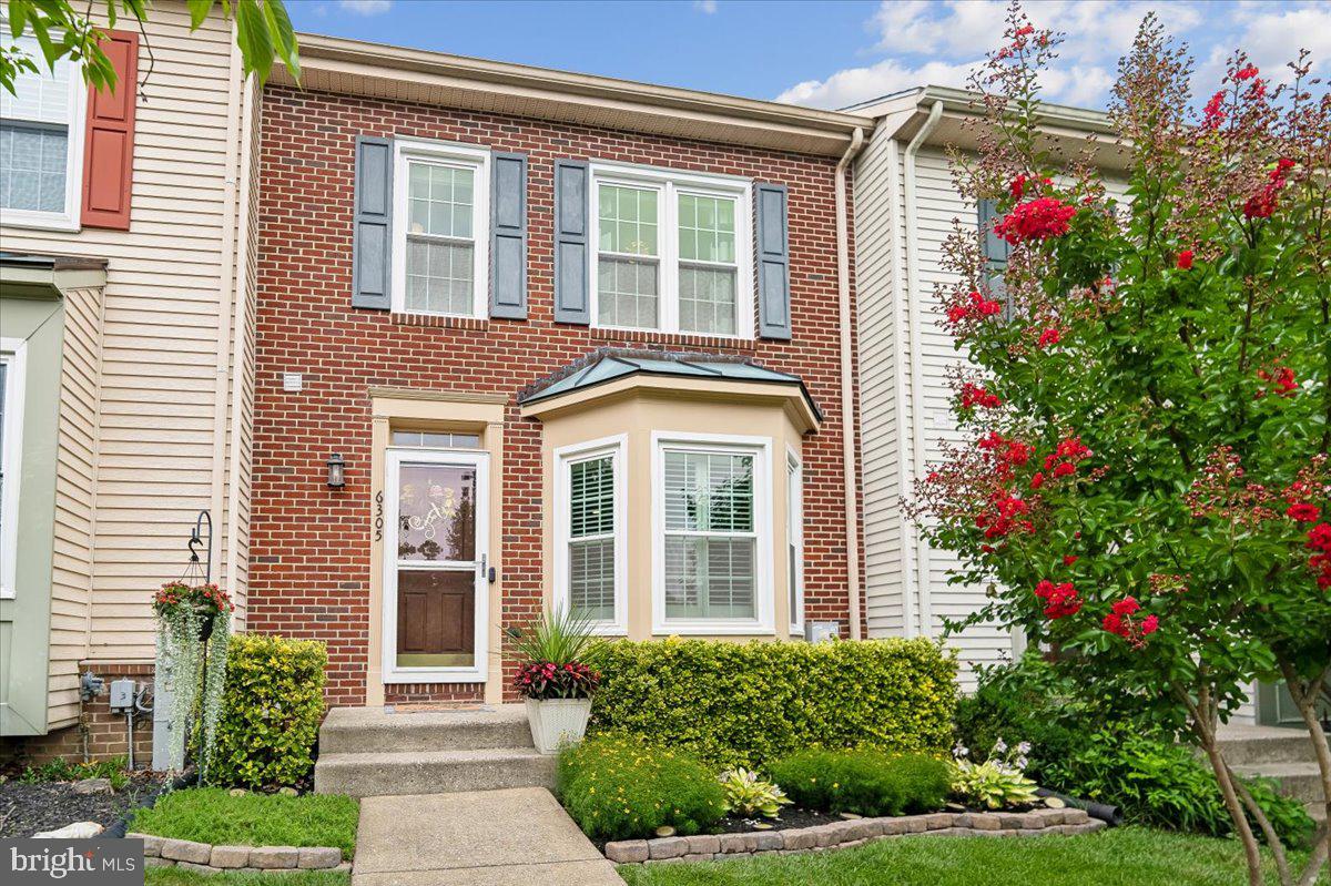 Welcome to this beautifully maintained 3-bedroom, 2.5-bath townhome in the desirable Willowood community of Elkridge. The bright, open main level is ideal for everyday living and entertaining, with seamless access to the rear deck—perfect for grilling, dining, or relaxing outdoors. The kitchen features granite countertops, stainless steel appliances, a center island, and ample cabinet space. Hardwood floors throughout the main and lower levels add warmth and style. Upstairs, the primary suite offers a walk-in closet and an en-suite bath with a large soaking tub and renovated walk-in shower ('20).  Additionally, there are two more bedrooms with vaulted ceilings and a full hall bath with tub/shower combo. The walkout lower level includes a family room with fireplace (gas line capped; conveys as-is), direct backyard access, and a storage area with rough-in for an additional bath, offering great expansion potential. Enjoy a peaceful setting backing to trees and open green space, not other townhomes, plus 2 assigned parking spaces and guest parking nearby. Recent updates include new smoke/co detectors ('26), sump pump ('26), refrigerator ('25), range ('23), dishwasher ('22), front storm door ('21), washer and dryer ('21), windows ('18), roof ('18), HVAC ('18),  new deck boards ('16), sliding doors ('16), and so much more! Conveniently located near shopping, dining, parks, and major commuter routes. Welcome home!