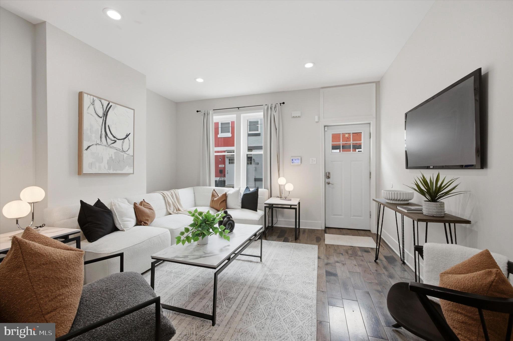 Welcome to 1331 N Newkirk Street. This 3 bedroom, 2.5 bathroom home offers open living spaces and modern amenities throughout. A warm and open living room invites you in featuring freshly painted walls, recessed lighting and gleaming floors. With high ceilings, this space feels both grand and intimate. A separate dining area offers flexible space for formal meals or a casual hang out. Just off the living room is a convenient first-floor powder room. The kitchen features white cabinets  and stainless steel appliances with plenty of counter space for appliances and food prepping. The kitchen was thoughtfully laid out and offers practical space for storage as well. The second level of the home features two bedrooms plus a shared hall bathroom. The hall bath features a crisp white vanity with sleek, simple lines that create a fresh and modern look. The tub and shower combo is finished with classic white tile. The third floor is reserved for the primary suite  and offers a large bedroom area, multiple closet spaces, upper floor laundry and a private ensuite bath. A glass-enclosed stand up shower, a white vanity and beautiful tile work give the space an elegant vibe. Located in the heart of Brewerytown, this home puts dining and entertainment steps away. Walk to local favorites like Human Robot, Rival Bros, Rybrew , Green Eggs Café and Together Skateboarding Coffee. Brewerytown’s growing food, drink, and cultural scene along Girard Avenue makes it a vibrant place to live and explore. Enjoy the neighborhood’s mix of historic charm and modern urban energy, all within easy reach of Fairmount Park, the Schuylkill River trails, the Philadelphia Zoo, Philadelphia's best museums and Center City attractions.