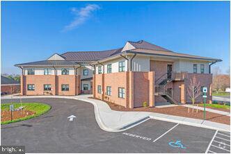 Beautifully built office building built in 2019 in very convenient Dunkirk, MD.  Right off Rt. 4.  This building offers 4 separate office suites ready for your business.   Secure entrance to the building as well as each suite.  Suite 101 offers 6 private rooms/offices, and is currently set up with 6 work stations, with the possibility of 6 more, and a break room.  Suite 102 has 3 private offices, 14 work stations, a private call room, and a break room.  Tenants also have a reception area and receptionist if they wish, a shared large conference room, and a large basement for larger meetings, trainings, or company get togethers.  CAM fees are included in advertised rate and cover, office cleaning, trash service, landscaping, parking lot snow removal and maintenance, electric, security system, and telephone service if desired.  Come and make these gorgeous office suites your business's new home!