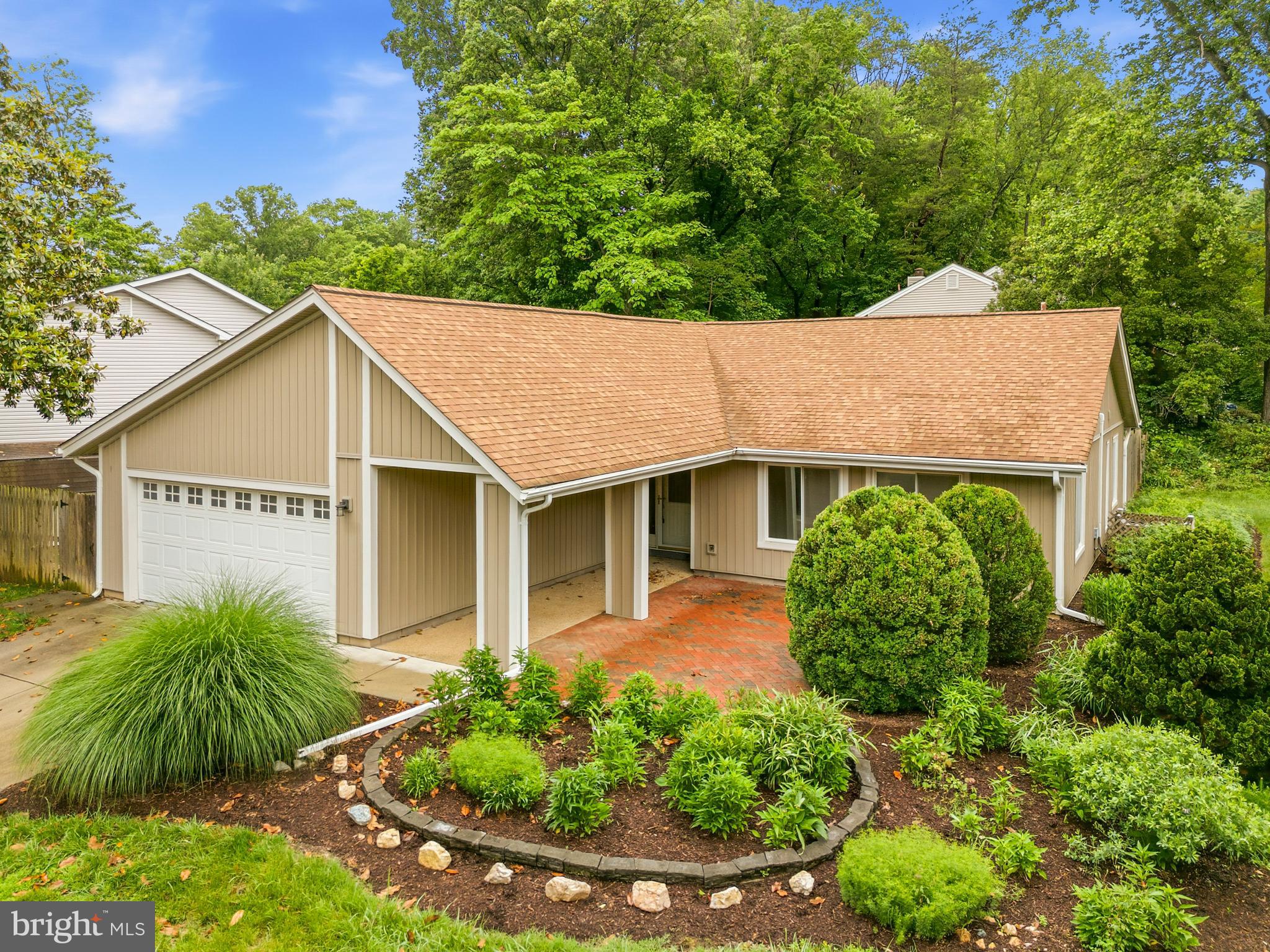 Welcome to this stunning single level ranch style residence beautifully positioned on a prime corner lot in the highly coveted Bonnie Brae subdivision of Fairfax, Virginia. This exceptional detached home offers the perfect blend of suburban tranquility and modern functionality. Spanning nearly fifteen hundred square feet of meticulously maintained living space, this contemporary gem features three bright bedrooms and two and a half bathrooms tailored for comfortable everyday living. Step inside to discover a bright and airy open floor plan accentuated by soaring cathedral ceilings, sleek laminate flooring, and elegant ceramic tile accents. The heart of the home is a spacious living area anchored by a beautiful fireplace, creating an inviting ambiance for cozy evenings or festive gatherings with loved ones. Culinary enthusiasts will delight in the dedicated breakfast area and the well appointed kitchen fully equipped with a modern range hood, self cleaning oven, and an icemaker refrigerator. Seamless indoor outdoor transitions are made easy via beautiful French doors and sliding glass doors that lead out to a pristine patio and porch setting. The sprawling corner lot provides a beautifully landscaped lawn, a partially fenced rear yard for maximum privacy, an extra storage shed, and an attached two car garage complete with an automatic door opener. This premium Fairfax County location delivers an incredible lifestyle for commuting, shopping, and entertainment seekers alike. Nestled in a quiet and highly walkable neighborhood, residents enjoy immediate access to pristine community sidewalks and scenic nearby parks such as Woodglen Lake Park and Sandy Run Stream Valley Park. Indulge in premier retail therapy and diverse dining options at the nearby Fairfax Corner, Fair Oaks Mall, and historic Downtown Fairfax. Commuters will benefit from superb proximity to major transportation arteries including the Fairfax County Parkway, I-66, and convenient public transit networks connecting you straight to Washington DC. Educational excellence is guaranteed as this property feeds into highly decorated institutions, allowing students to attend Bonnie Brae Elementary School located just a short walk away, as well as the renowned Robinson Secondary School. Call today for your private showing!