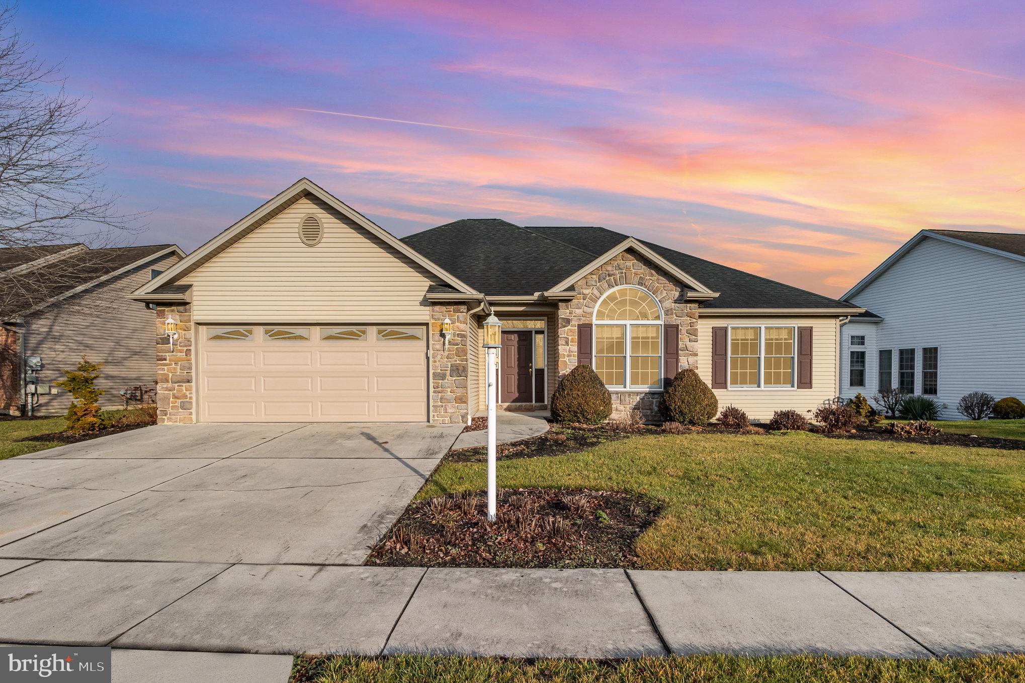 Nestled in the sought-after Mechanicsburg School district, this inviting Ranch home offers a perfect blend of comfort and space. Located in the desirable Ashcombe Farms community, this residence boasts a 3-bedroom, 2.5-bathroom floor plan that is both spacious and functional.  The cozy gas fireplace is perfect for chilly evenings, while the skylight in the living room fills the space with natural light.  The well-designed eat-in kitchen comes with updated appliances and countertops.  The breakfast dining area creates a perfect spot for casual meals while the formal dining room features hardwood floors, tray ceiling and crown molding.  A delightful sunroom, located just off the dining room, provides a tranquil space to relax and enjoy the picturesque views of the surroundings.  The basement, with poured walls, offers significant potential for expansion and customization. The basement also features a bonus room, large closet and half bath.  While the property is move-in ready, a few minor cosmetic upgrades present an exciting opportunity to personalize and make it your own.  Don't miss the chance to turn this property into your dream home.