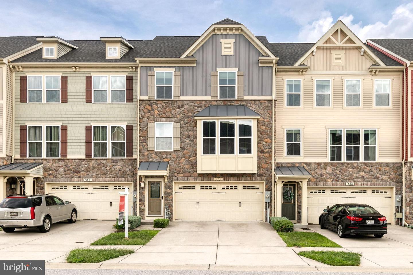 Welcome to 508 Fox River Hills! This beautifully maintained three-bedroom, two-full and one-half bath, two-car garage townhome is nestled in the sought after and amenity rich community of Creekside Village. The expansive front wall of windows bathes the whole living area in natural light. The large kitchen and dining area boasts plenty of storage, stainless steel appliances, an island fit for entertaining, and a built-in bar perfect to prepare your morning coffee. Enjoy your evenings on the rear deck or walk-out patio backing to the woods. The owner’s suite features a large walk-in closet, unique tray ceiling, and a bathroom with double vanity, soaking tub, and large step-in shower with a bench. The bonus room on the ground level is perfect for a cozy den for movie night or a game room for entertaining. Residents of Creekside Village have NO FRONT FOOT FEE and enjoy lawn and communal area maintenance, clubhouse with 24-hour fitness center, picnic and play areas, community pool, a dog park, and much more! Conveniently located near routes 10, 100, 97, and 695 - you will love the easy commute to Baltimore, Ft. Meade, BWI, and Annapolis. Add this home to your MUST-SEE list!