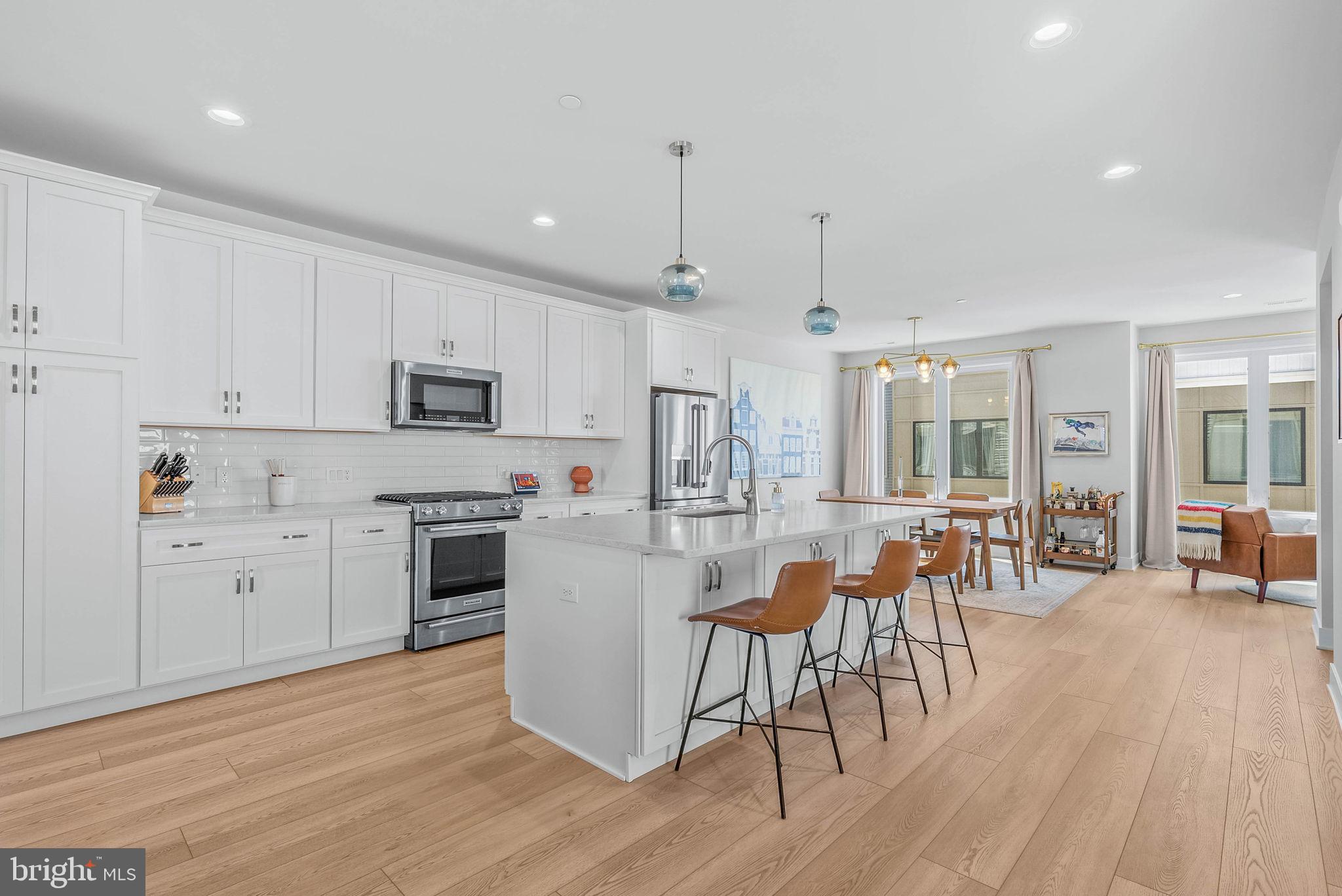 Welcome to this exceptional Toll Brothers model home in the highly sought-after Northbank community, where refined design meets elevated city living. Perfectly positioned, this home captures stunning skyline views from both the front of the home and the primary bedroom, while a massive private roof deck offers an even more impressive vantage point of the city. Inside, you’ll find 3 spacious bedrooms along with a bright, open living room that flows seamlessly into a versatile bonus den—ideal for a home office or additional lounge space. 

The expansive kitchen is designed for both everyday living and entertaining, complemented by a dedicated dining area and abundant closet space throughout. This home also benefits from a valuable tax abatement with approximately 6–7 years remaining, keeping ownership costs attractive. Located just moments from Ballers Sports Club and offering convenient access to I-95 in both directions as well as a quick route to the airport, the location checks every box for accessibility and lifestyle. Opportunities like this are rare—you simply won’t find newer construction with parking at this price point in this zip code. With the continued development of the Delaware waterfront, this home also presents strong long-term upside, making it as smart an investment as it is a beautiful place to live.