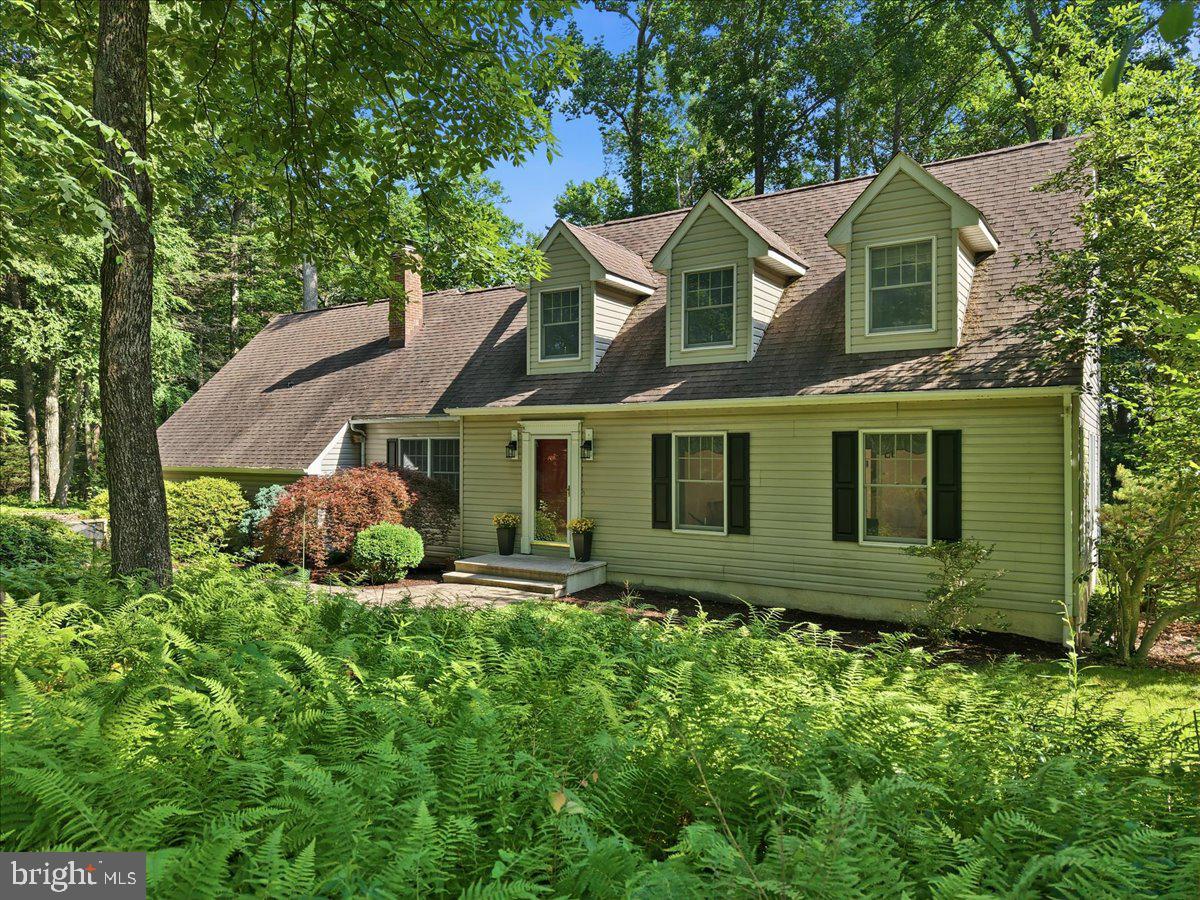 Hamilton Township Cape Cod on over 1 acre in the Stroudsburg School District! This 3-bedroom, 2.5-bath home offers a beautifully redone chef's kitchen, updated bathrooms, tons of storage, & a warm, inviting living area with a wood-burning fireplace. Major comfort features include a new gas furnace, central AC, whole-home humidifier, & generator for added peace of mind. The expansive walk-out basement offers endless potential for additional living space, a recreation room, home office, gym, or guest suite. The included pool table adds instant fun and makes the space ready for entertaining from day one. Outside, enjoy a large deck, relaxing screened porch, spacious yard, mature setting, and your own raspberry patch. A wonderful combination of updates, charm, storage, outdoor living, & no HOA all on over an acre of wooded & landscaped property! An opportunity like this home does not come along often!
